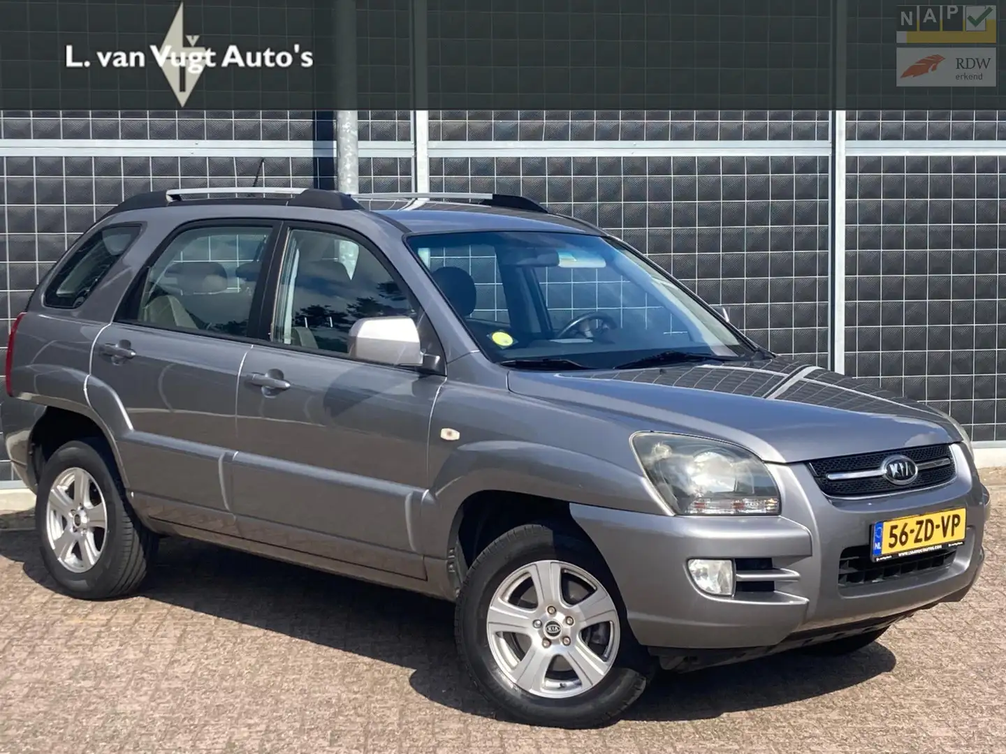 Kia Sportage 2.0 CVVT X-ecutive Grijs - 1