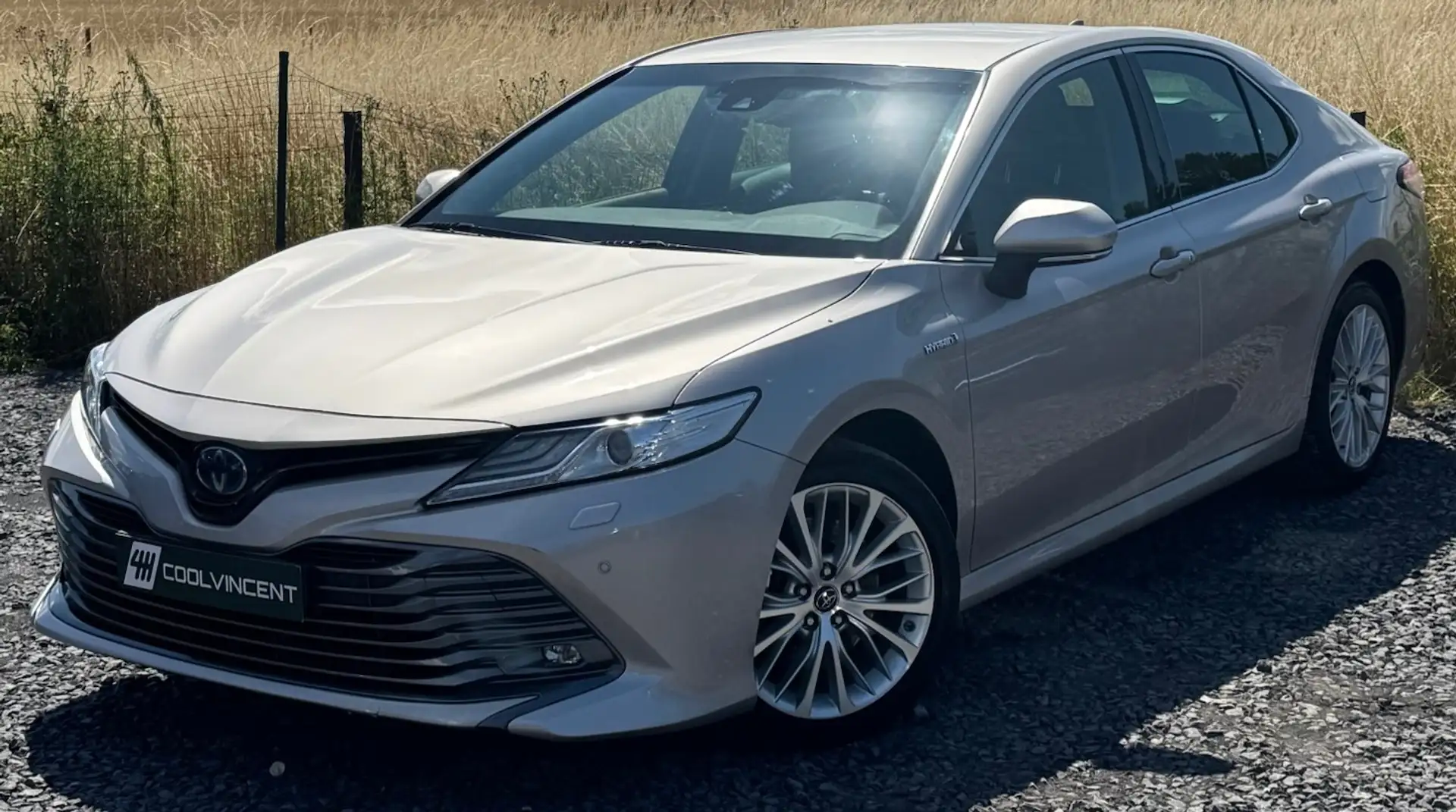 Toyota Camry Hybrid 2.5 - Sg chauffants - Cam - Keyless - Full Bruin - 1