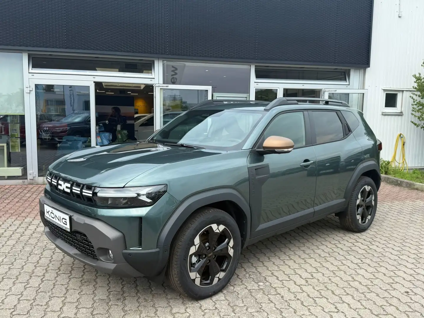 Dacia Duster Extreme HYBRID 140 Grün - 1