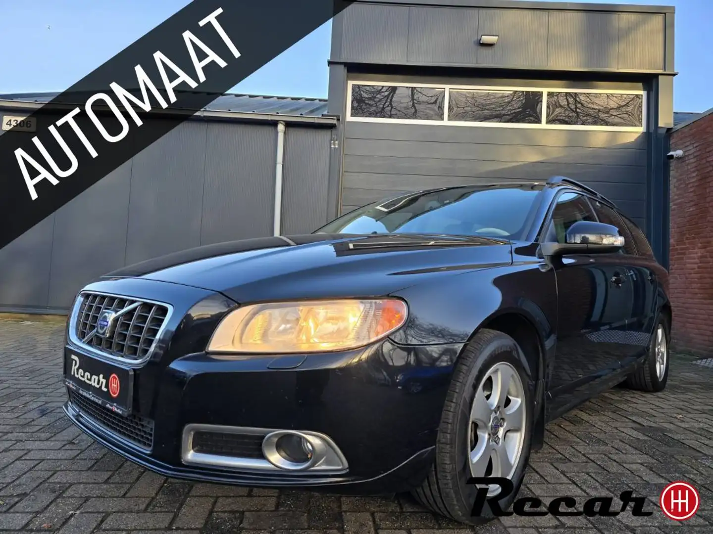 Volvo V70 3.2 Summum/Automaat/Pdc/Trekh/Cruise Schwarz - 1