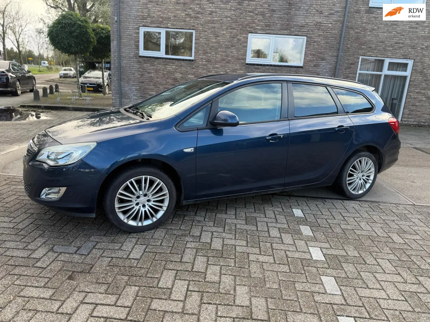 Opel Astra Sports Tourer 1.4 Turbo Edition ((( apk 08-2026 )) Blauw - 1