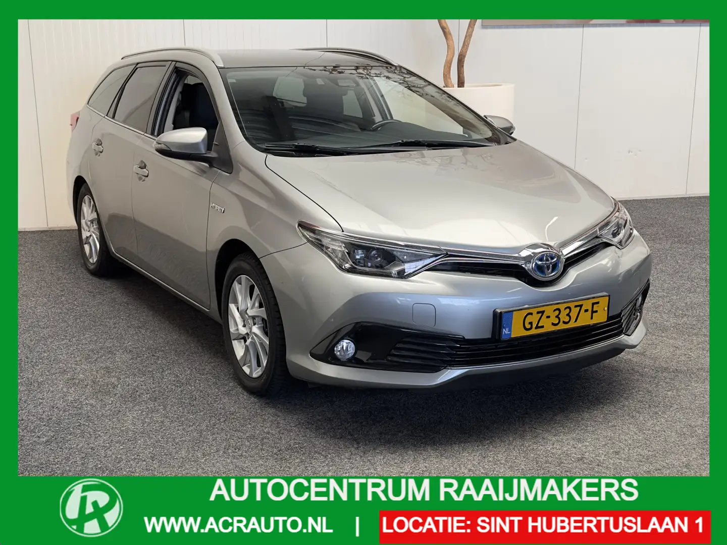 Toyota Auris TOURING 1.8 HYBRID LEASE PRO NAVIGATIE CRUISE CONT Grijs - 1