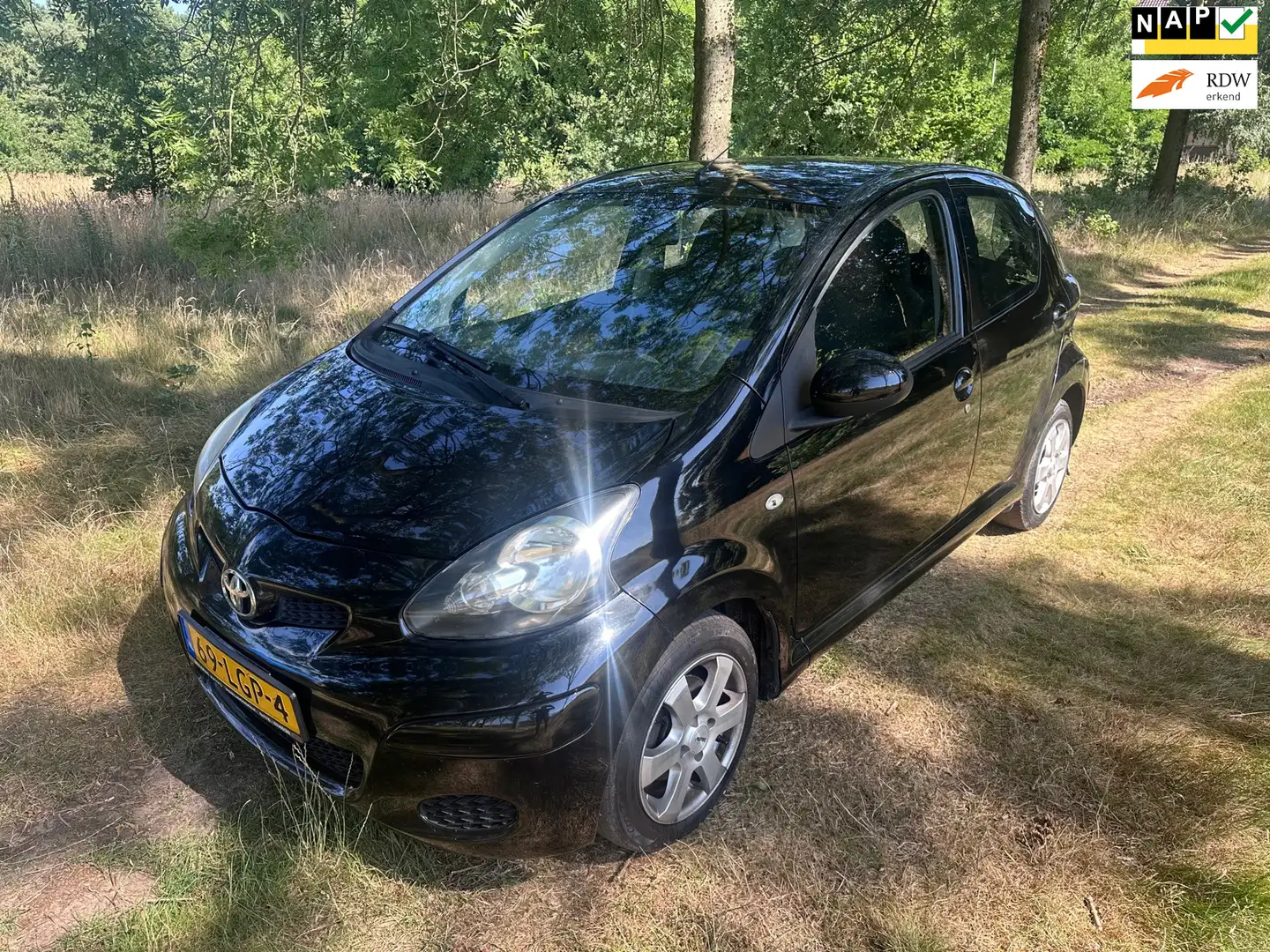 Toyota Aygo 1.0-12V Comfort apk t/m 21-04-2026 Zwart - 1