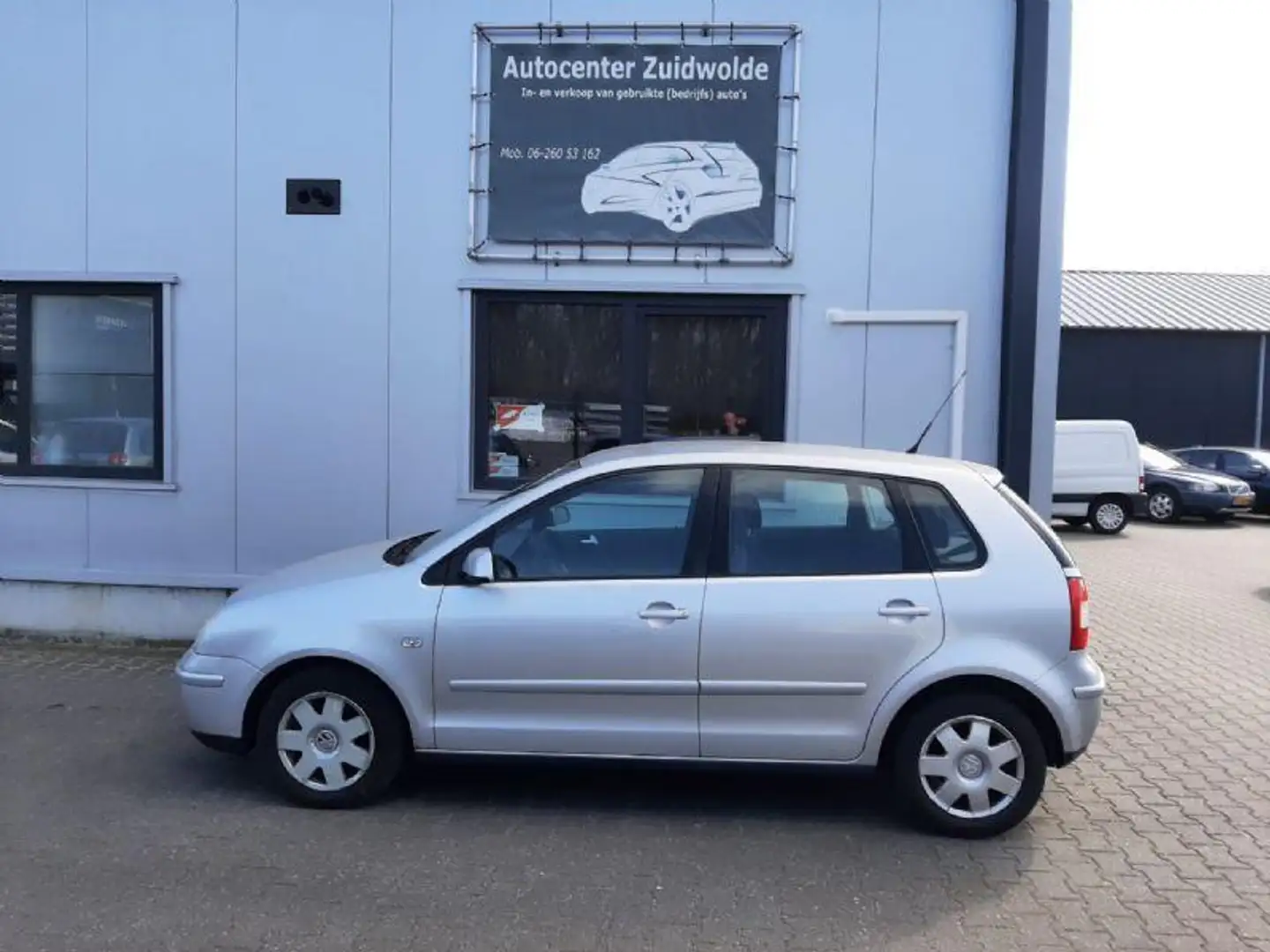 Volkswagen Polo 1.4-16V Highline clima cruise lmv apk 4-2026 Grijs - 2