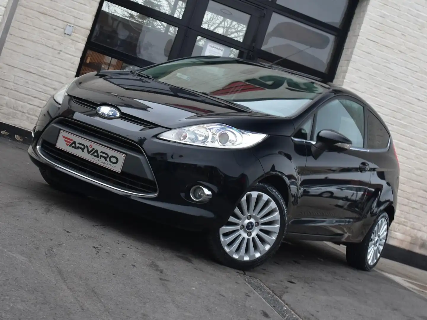 Ford Fiesta 1.25i Titanium Xenon / Airco / Garantie Schwarz - 1