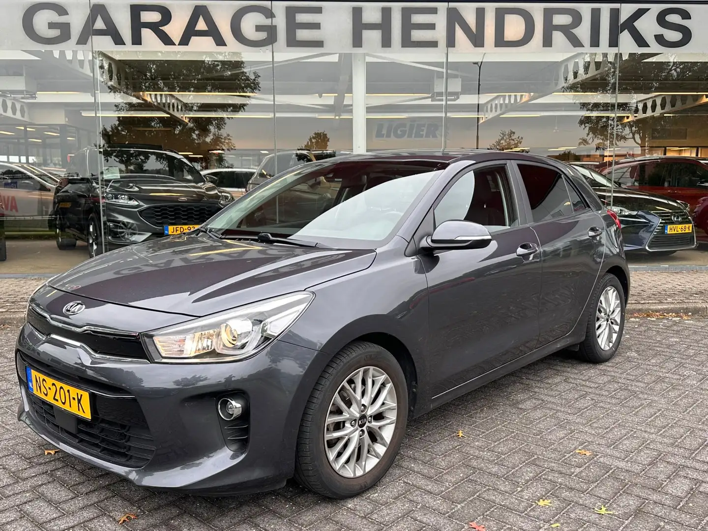 Kia Rio 1.0 TGDI First Edition | Airco | NAP | Navi | Came Gris - 1