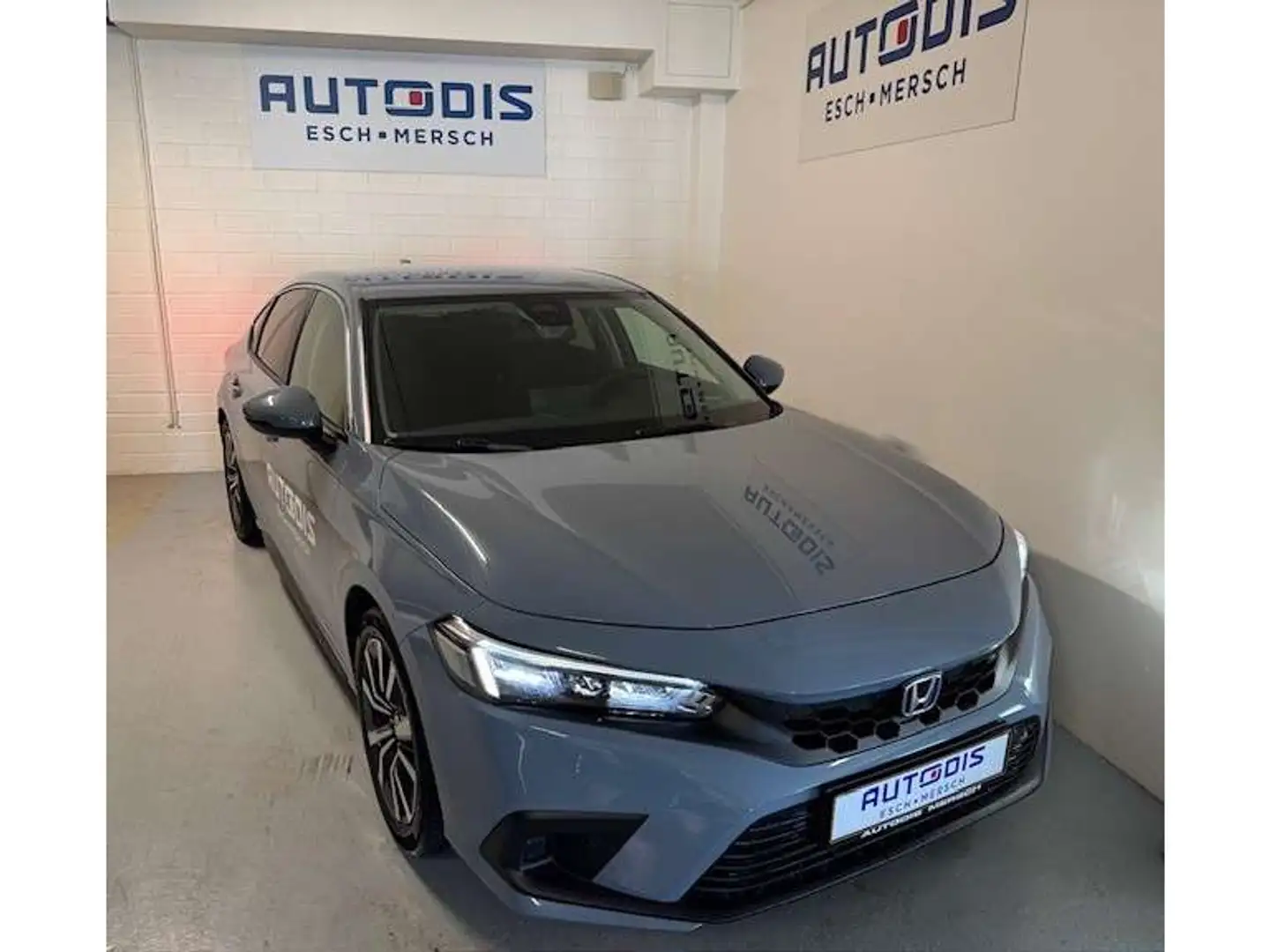 Honda Civic 2.0 e;HEV ELEGANCE HYBRID Modrá - 1