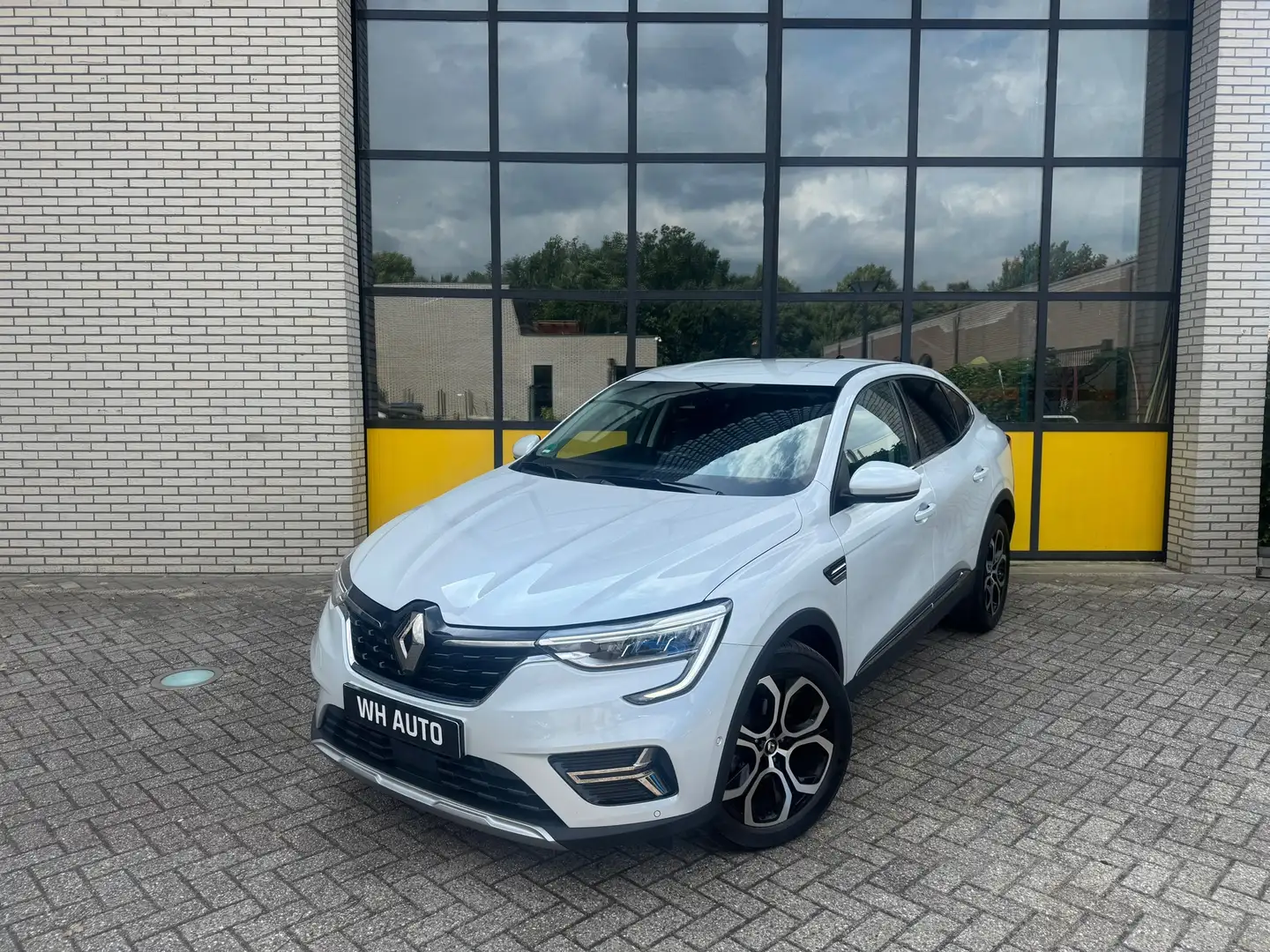 Renault Arkana 140PK Adaptieve cruise, stoel en stuurwielverwarmi Wit - 1