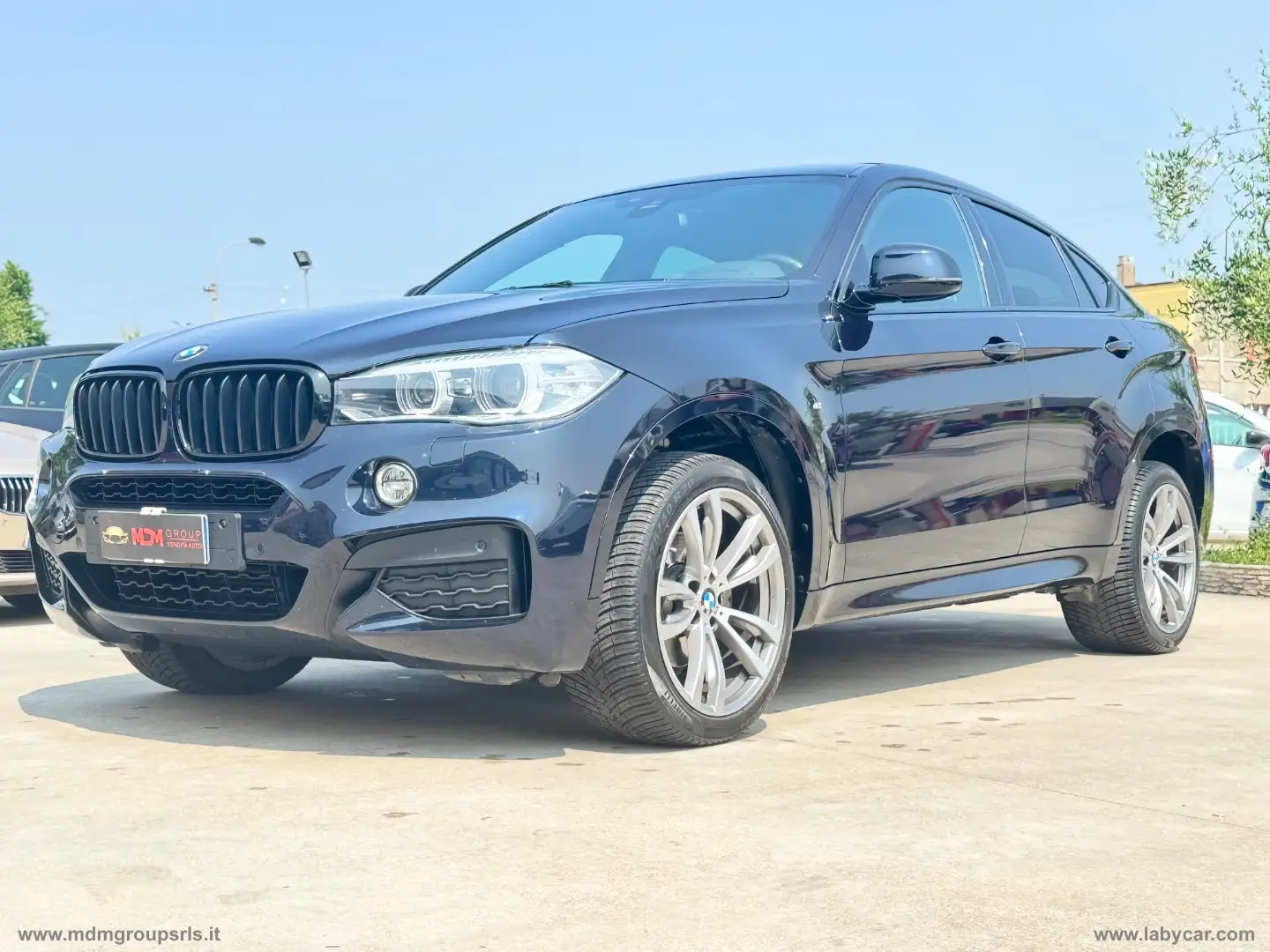 BMW X6 xDrive30d 258CV Msport Blauw - 1
