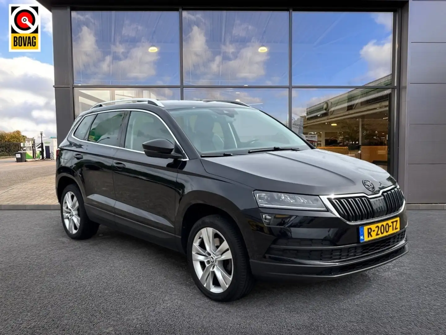 Skoda Karoq 1.0TSI Style Bus. | Veel opties! | Leer | Camera | Schwarz - 1
