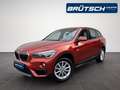 BMW X1 sDrive 20 i Advantage AUTOMATIK / LEDER / NAVI / S Orange - thumbnail 1