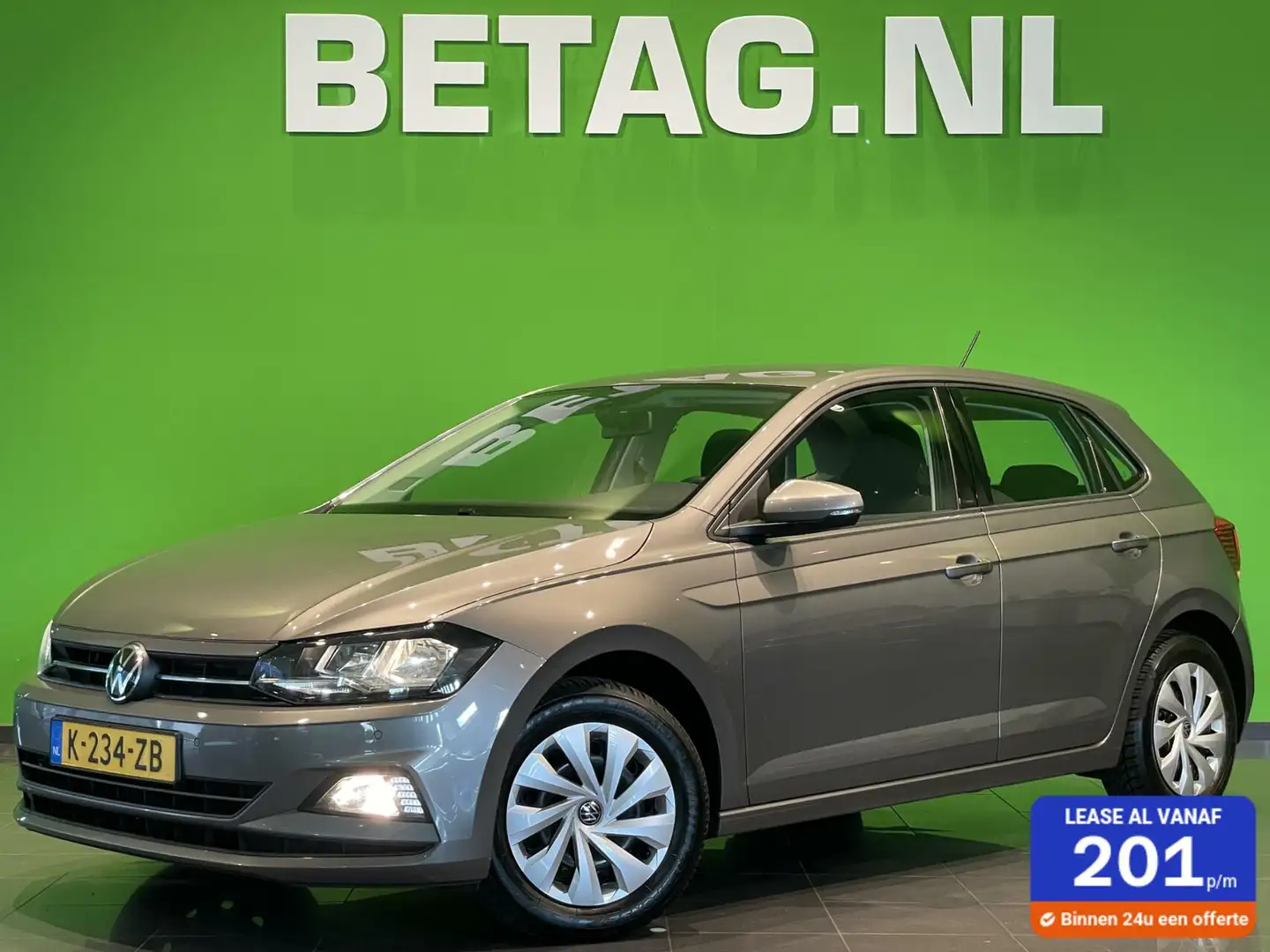 Volkswagen Polo 1.0 TSI Comfortline Business | Navi | PDC | Grijs - 1