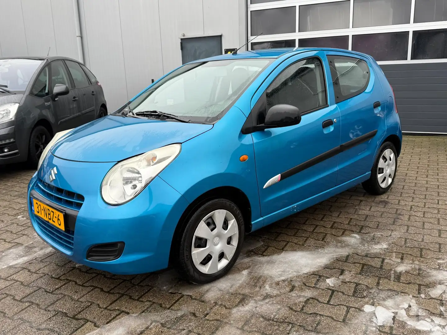 Suzuki Alto 1.0 Comfort Plus 5-Deurs 2010 Airco NL auto Blau - 1