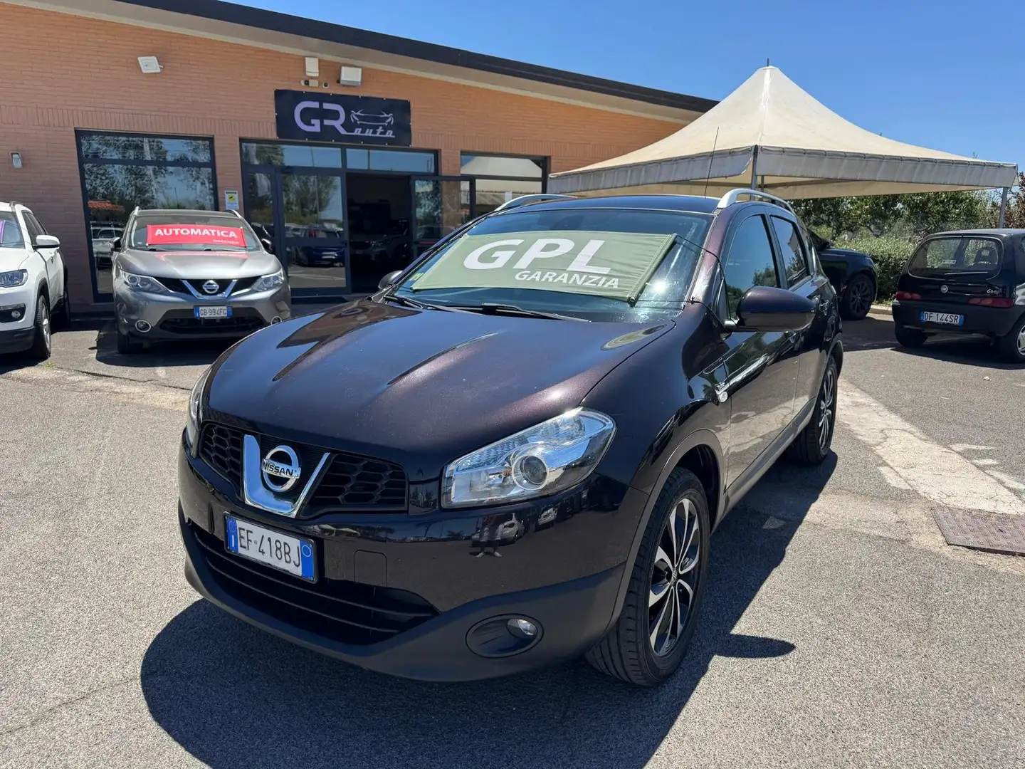 Nissan Qashqai 1.6 GPL N-TEC TETTO NAVI 2010 Paars - 1