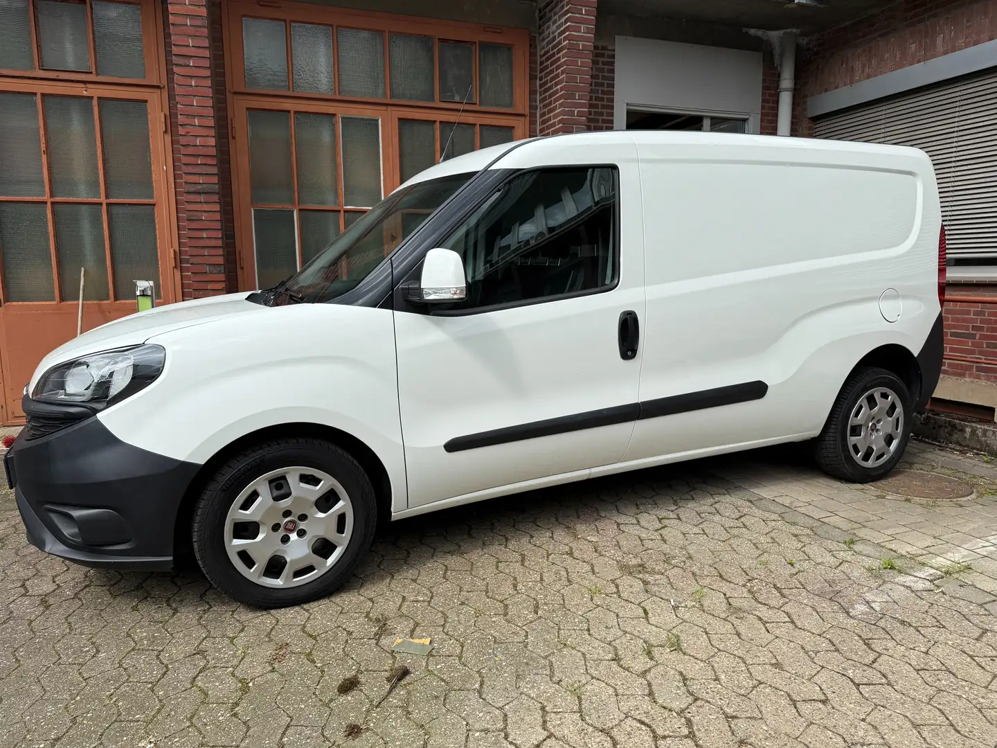 Fiat Doblo Cargo SX1,6 Multijet - Zuverlässiger Partner Weiß - 1