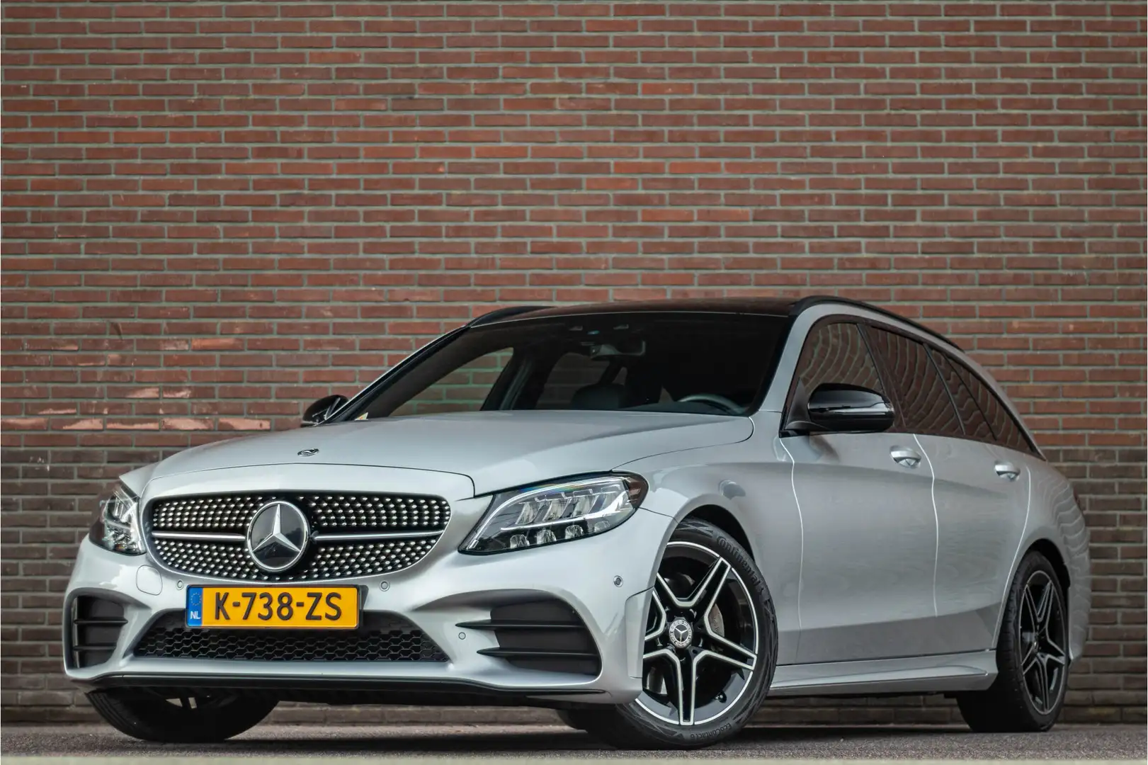 Mercedes-Benz C 180 AMG Night, 43.000km NAP, Panoramadak, Stoelverwarm Gris - 1