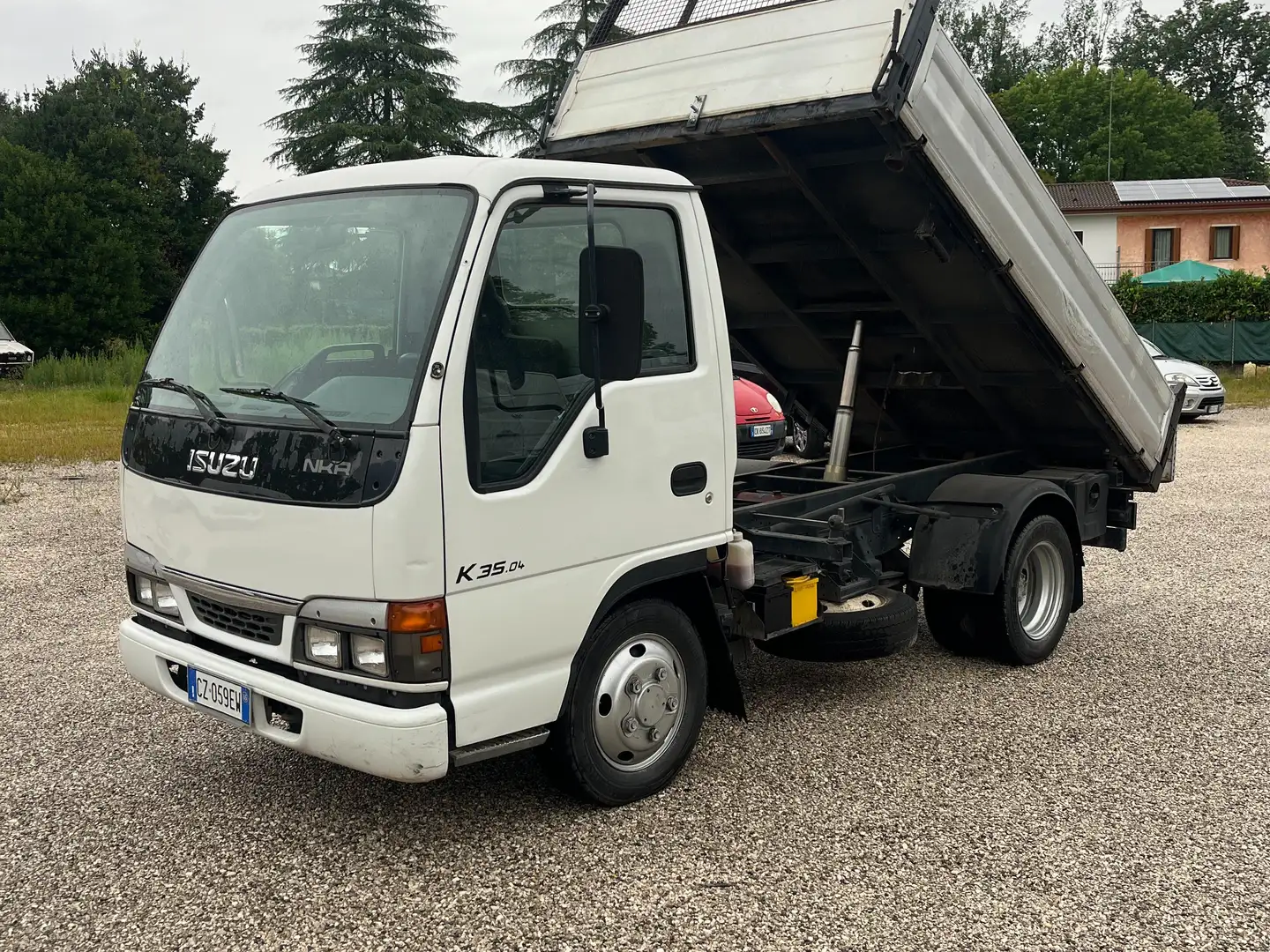 Isuzu NKR 35 Cassone Ribaltabile Trilaterale Blanco - 1