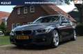 BMW 320 3-serie Touring 320i Executive Aut. | M-pakket | P Grijs - thumbnail 1