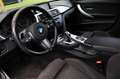 BMW 320 3-serie Touring 320i Executive Aut. | M-pakket | P Grijs - thumbnail 2
