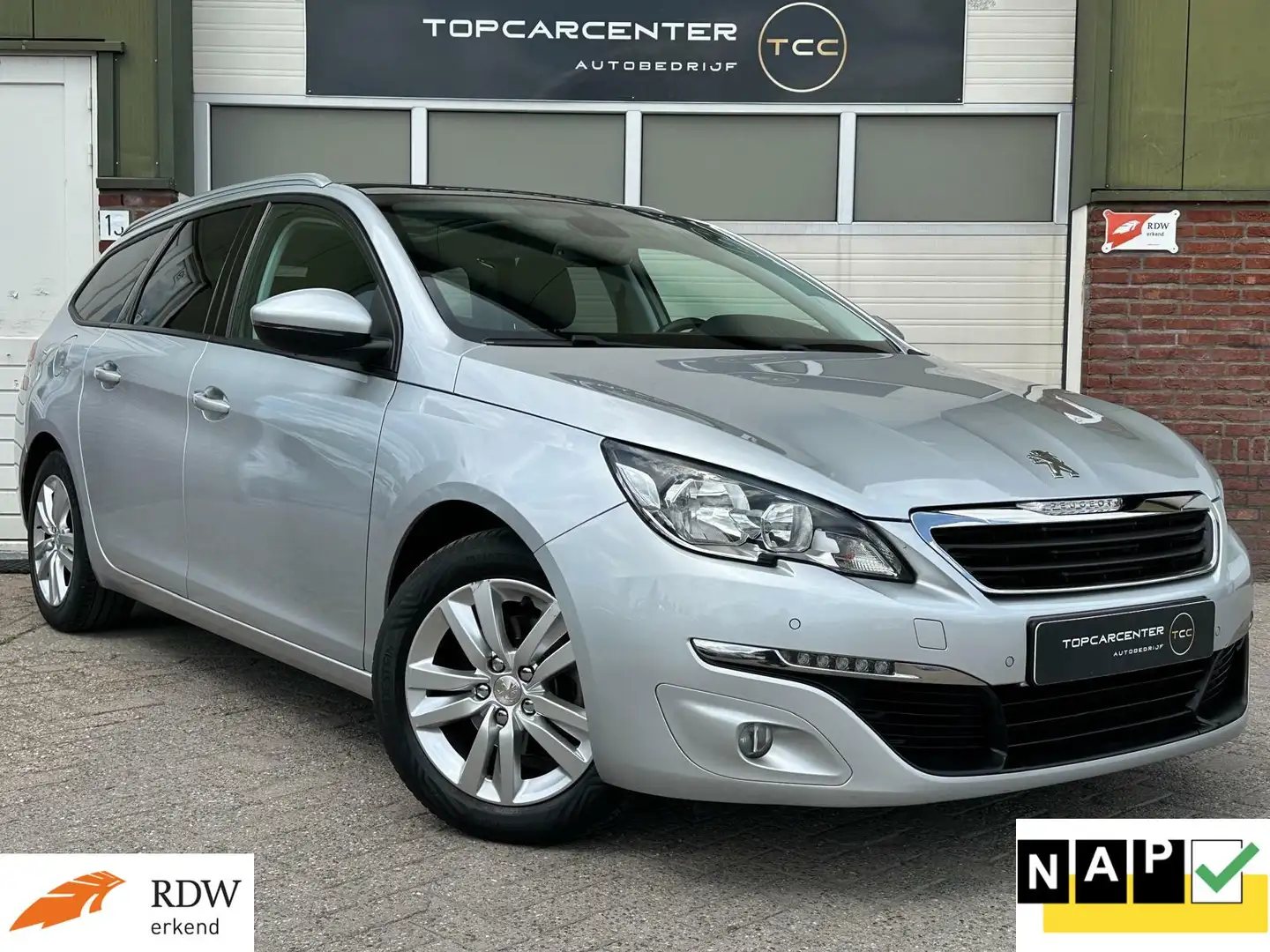 Peugeot 308 SW 1.2 PureT Executive/PANP/NAVI/PARKS/APK/NAP Grijs - 1
