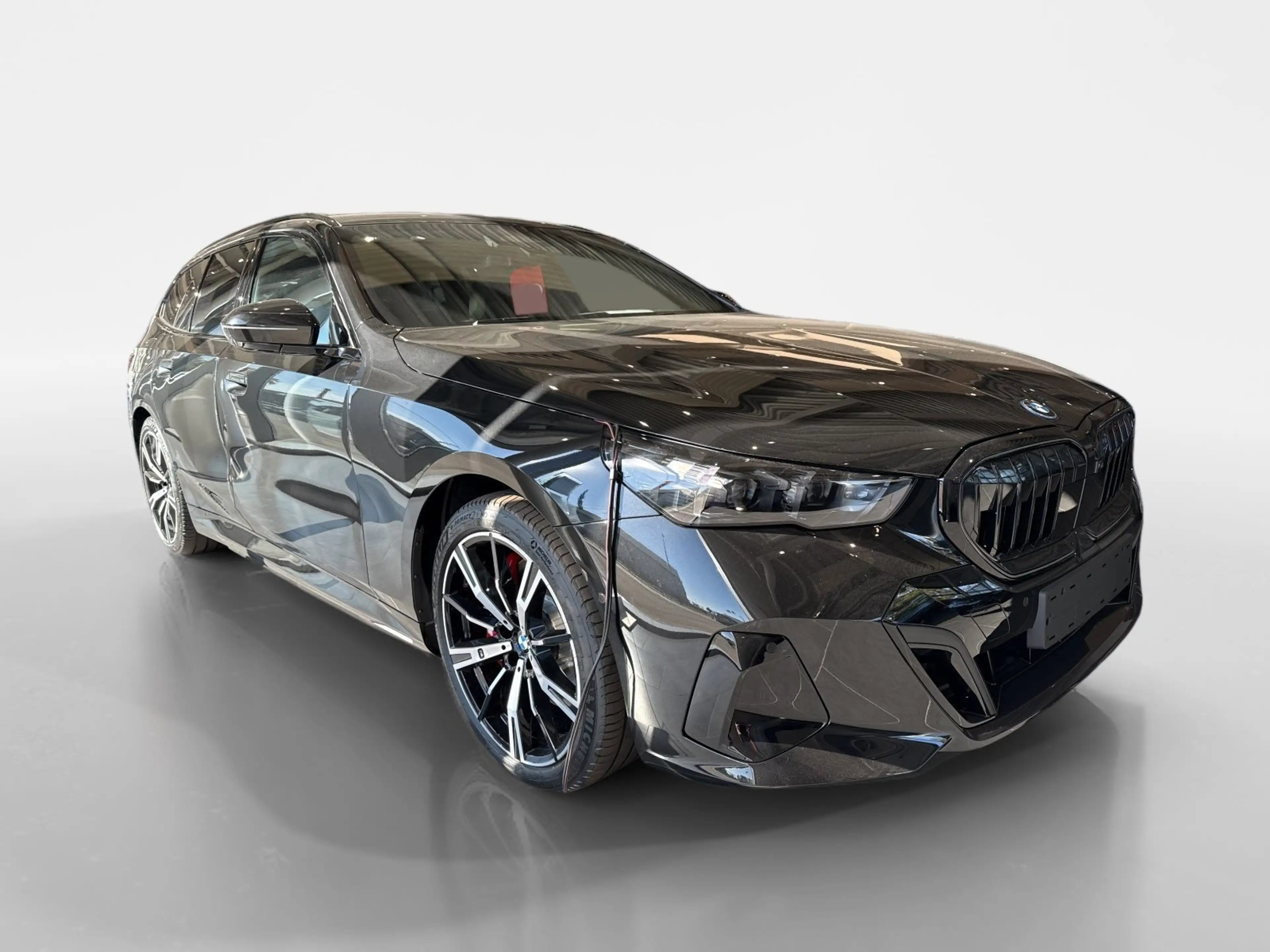 BMW 550 e xDrive Touring — photo 7