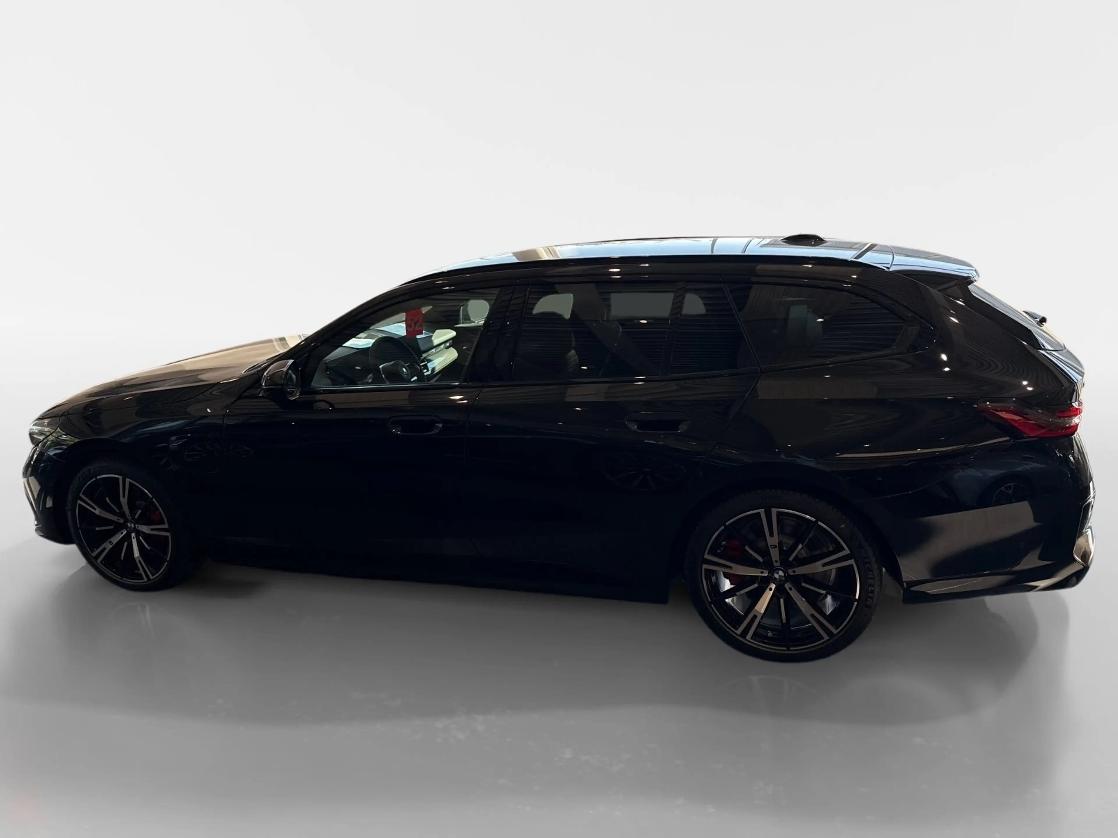 BMW 550 e xDrive Touring — photo 2
