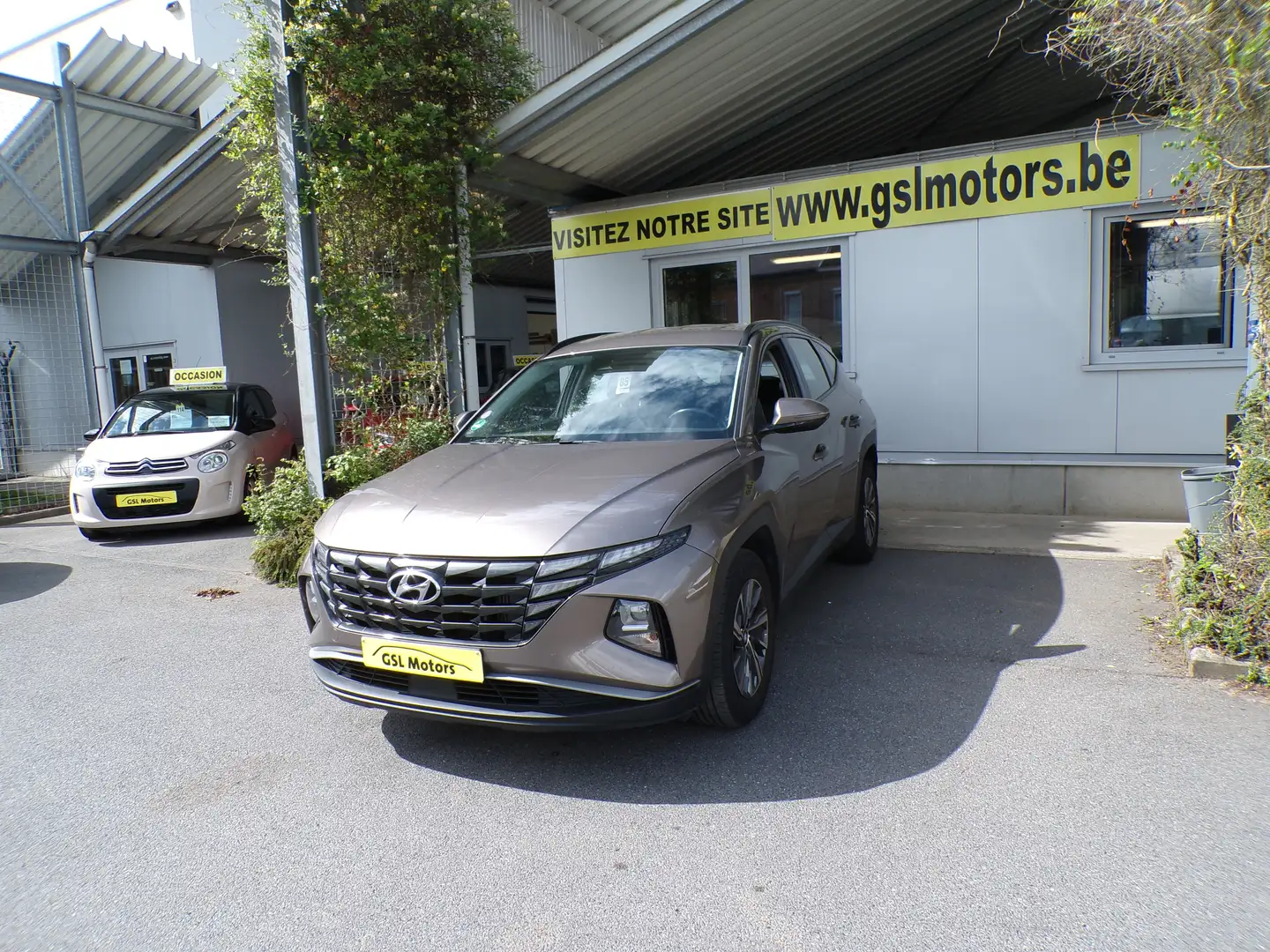Hyundai TUCSON 1.6 T-GDi 150cv brun 04/22 Airco GPS Camera Cruise Bruin - 1