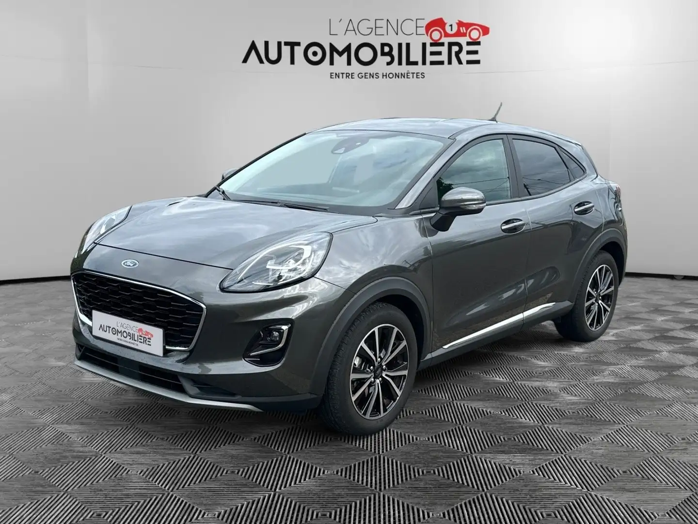 Ford Puma Puma  Hybrid Aut. Titanium Garantie tot 5 jaar Grijs - 1
