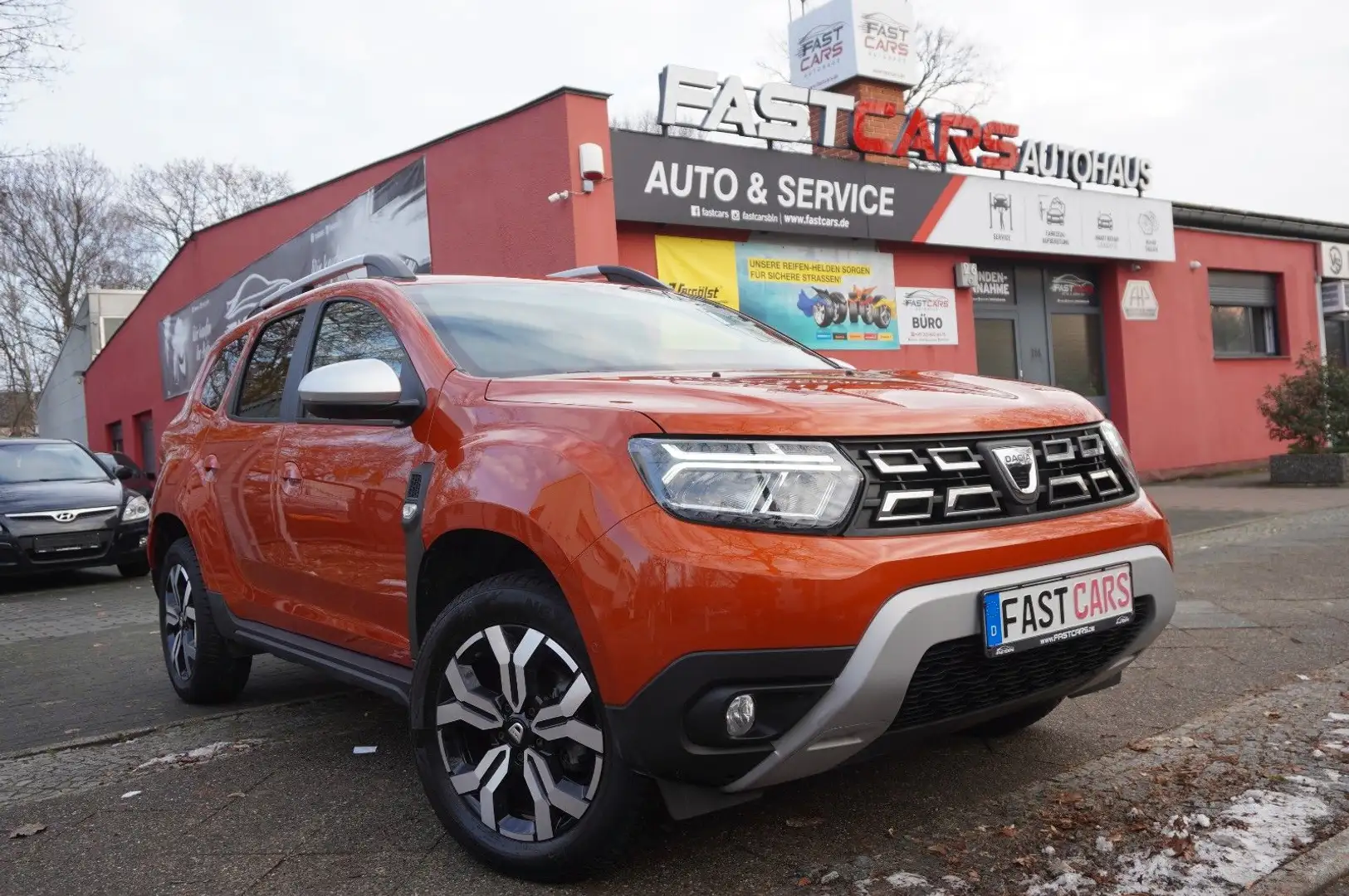 Dacia Duster II Prestige+ 360-Kamera Carplay Navi SHZ Orange - 1