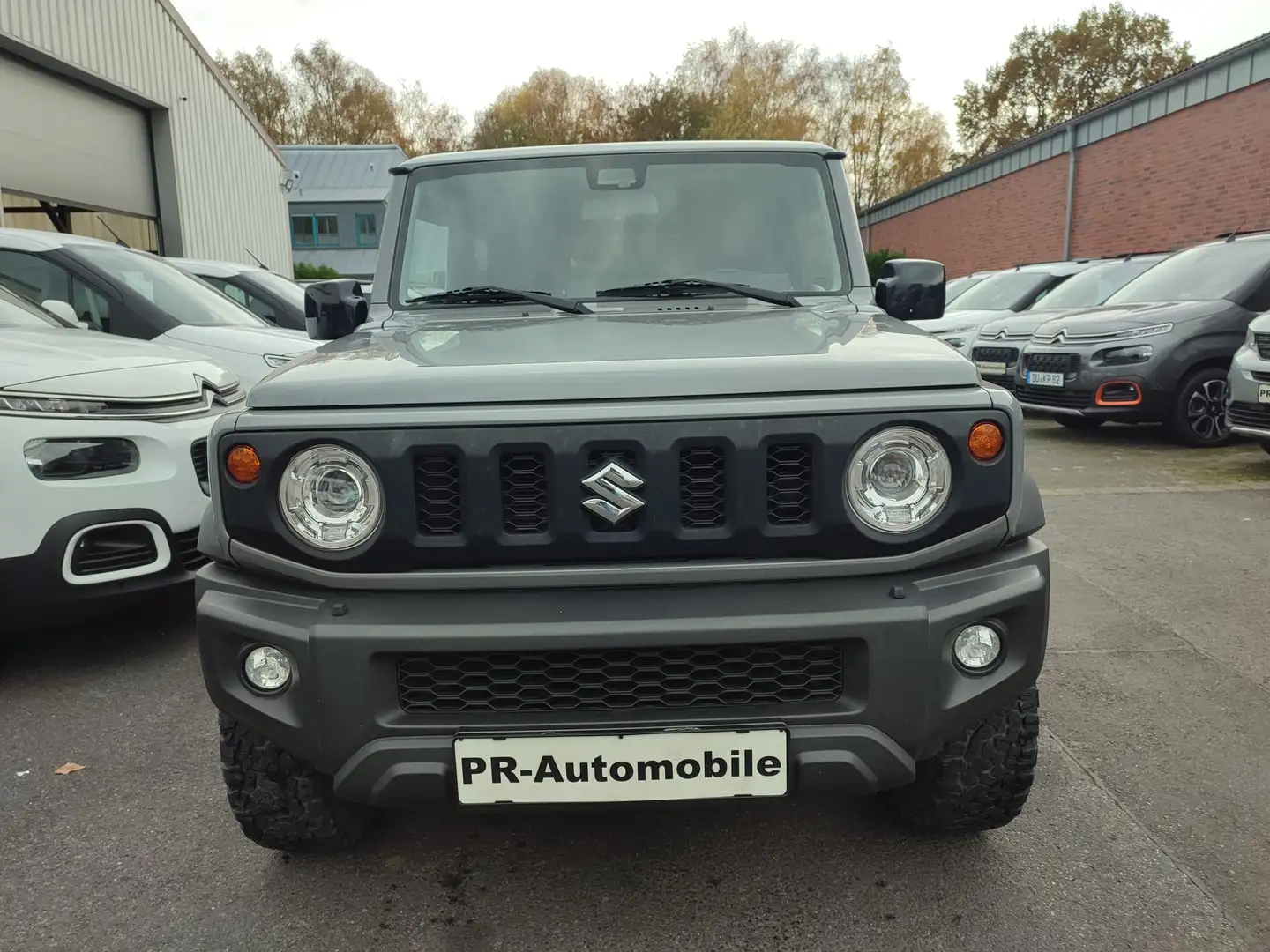 Suzuki Jimny Jimny 1.5 ALLGRIP Comfort+ Klimaaut/Navi+Cam Grau - 2