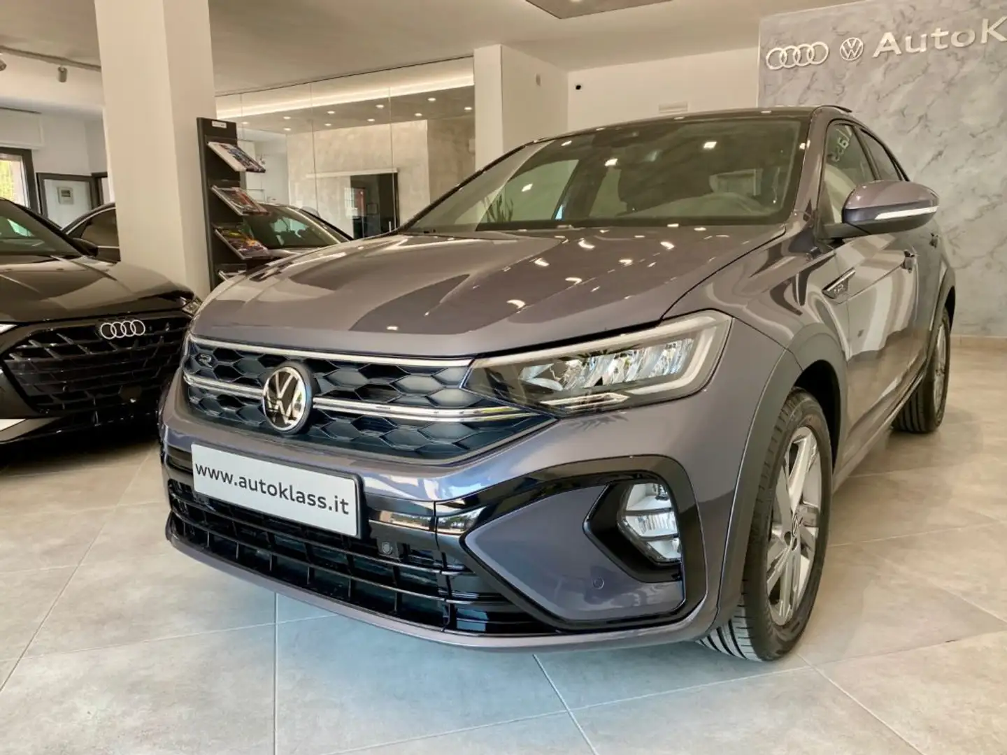 Volkswagen Taigo TSI 115 CV R-Line Int/Ext *NUOVA* Gris - 1
