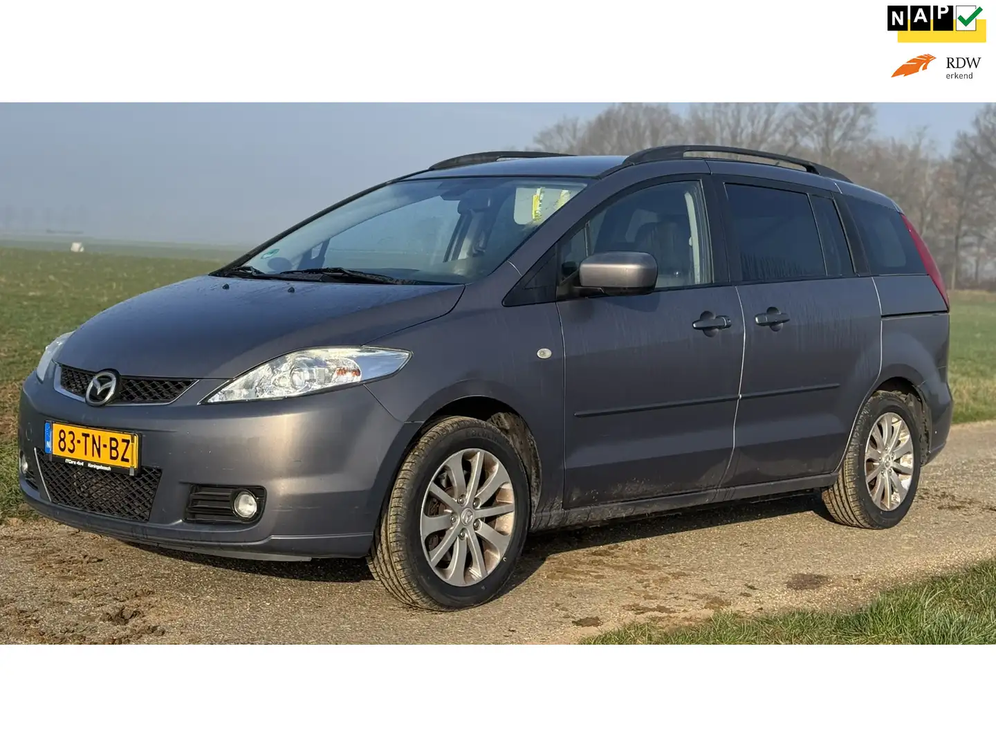 Mazda 5 2.0 Executive |trekhaak |airco |7-zitter!| Grau - 1