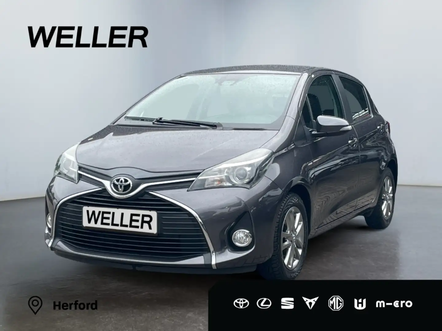 Toyota Yaris 1.33 Comfort *Kamera*Bluetooth*Bremsass* Grijs - 1