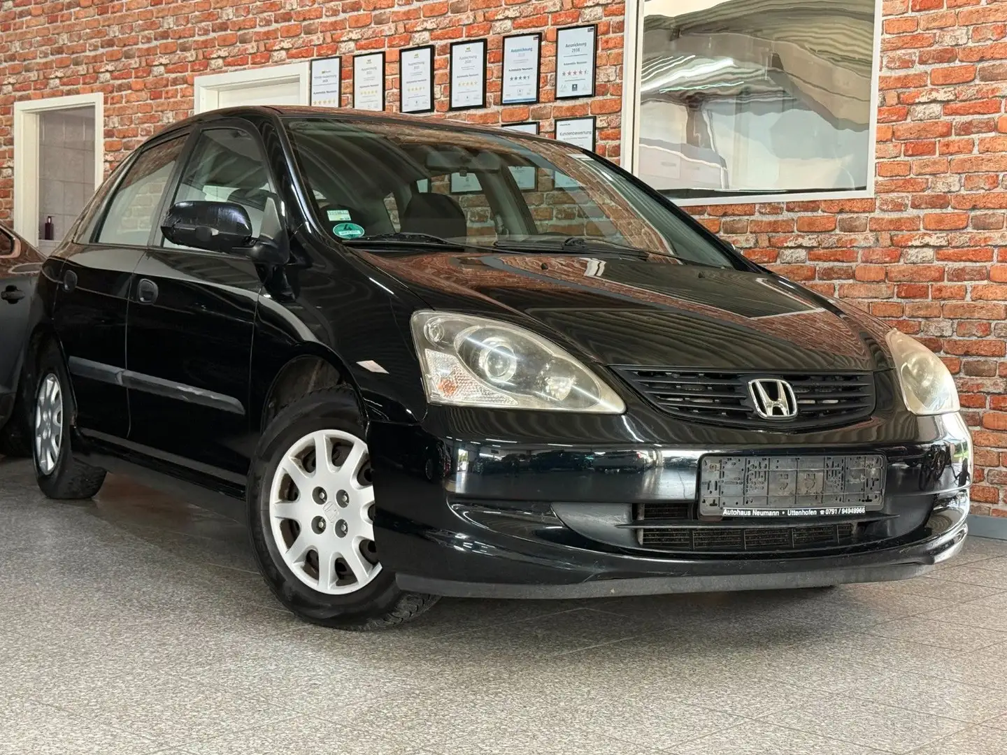 Honda Civic Lim. 5-trg. 1.4 i LS-Klima Schwarz - 1