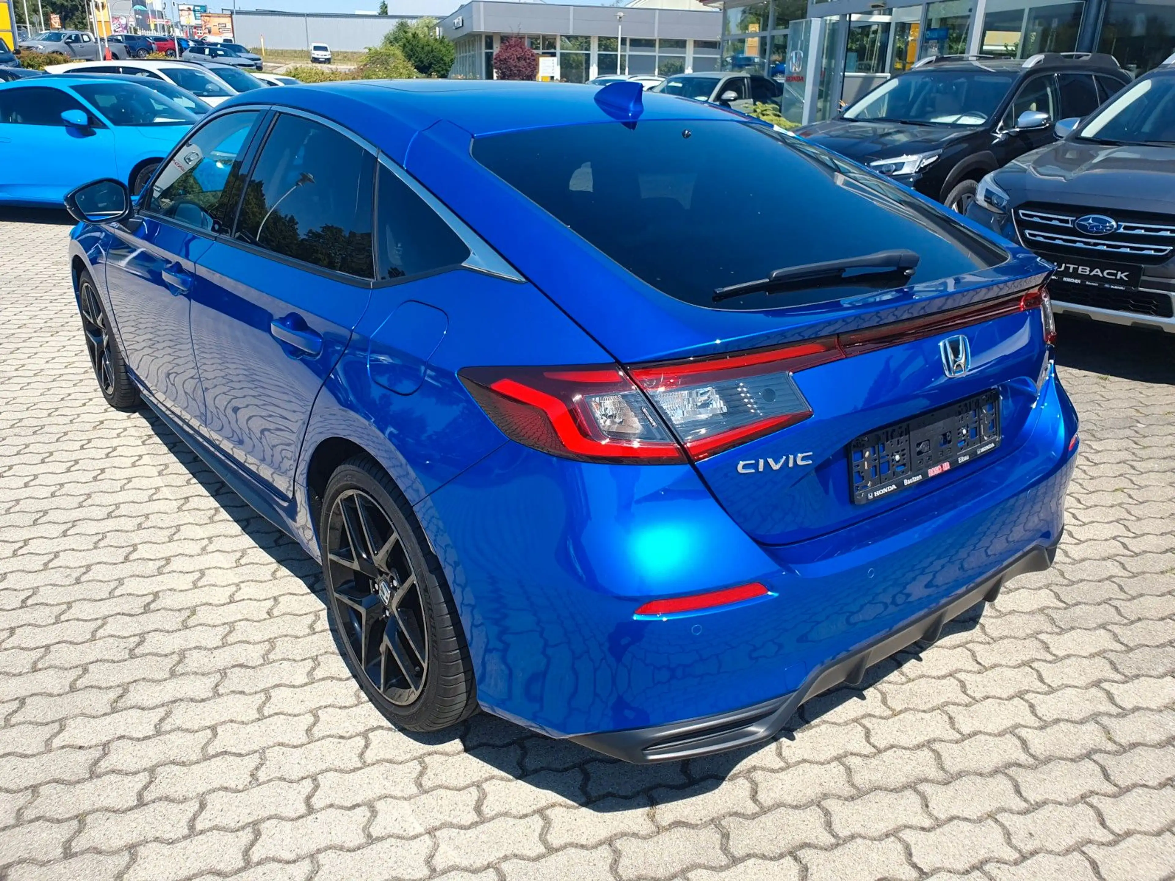 Honda Civic 2,0 e:HEV Advance "Pano, Leder, Bose" — photo 11