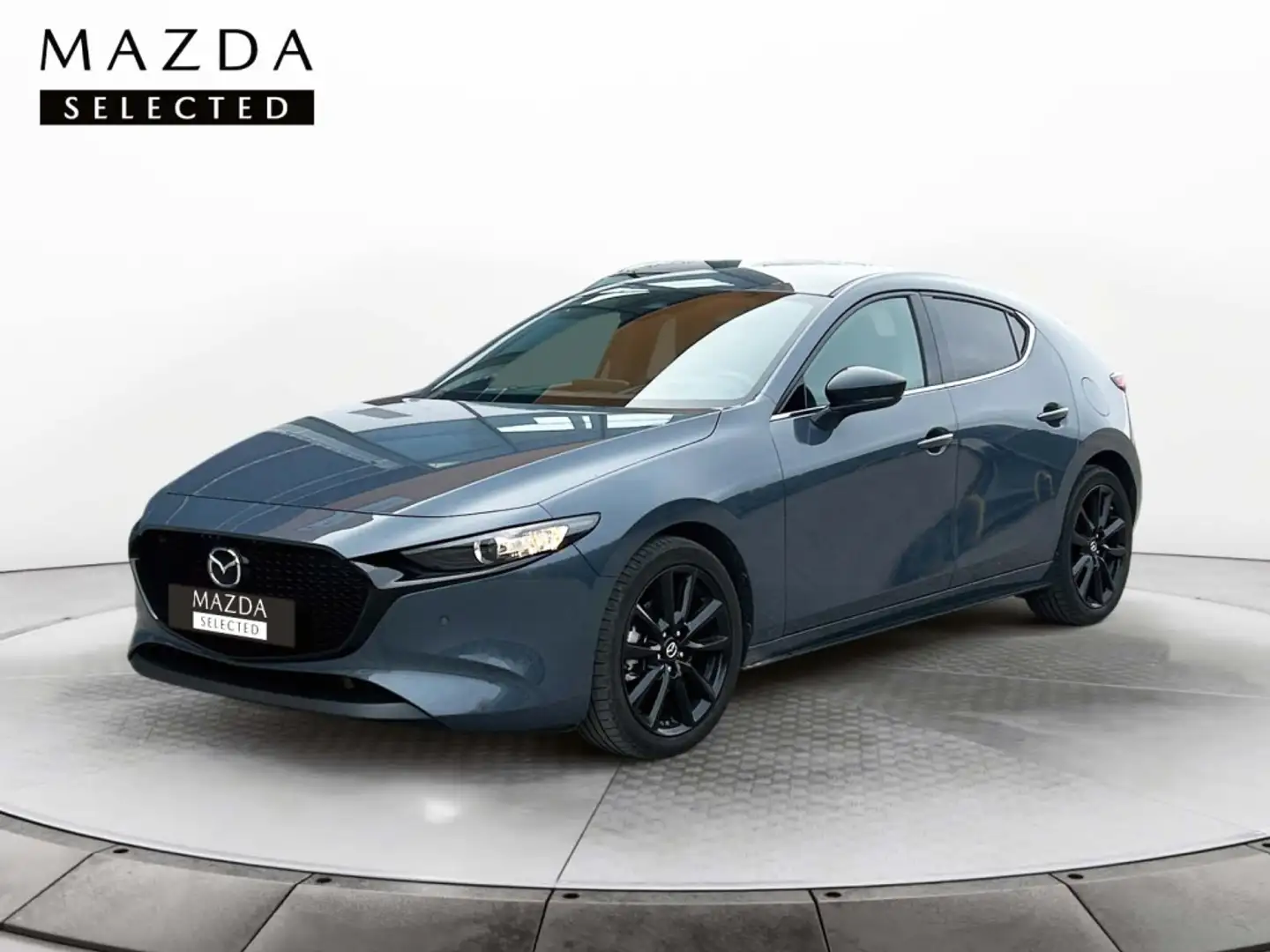 Mazda 3 2.0 e-Skyactiv-G Homura 110kW Gris - 1