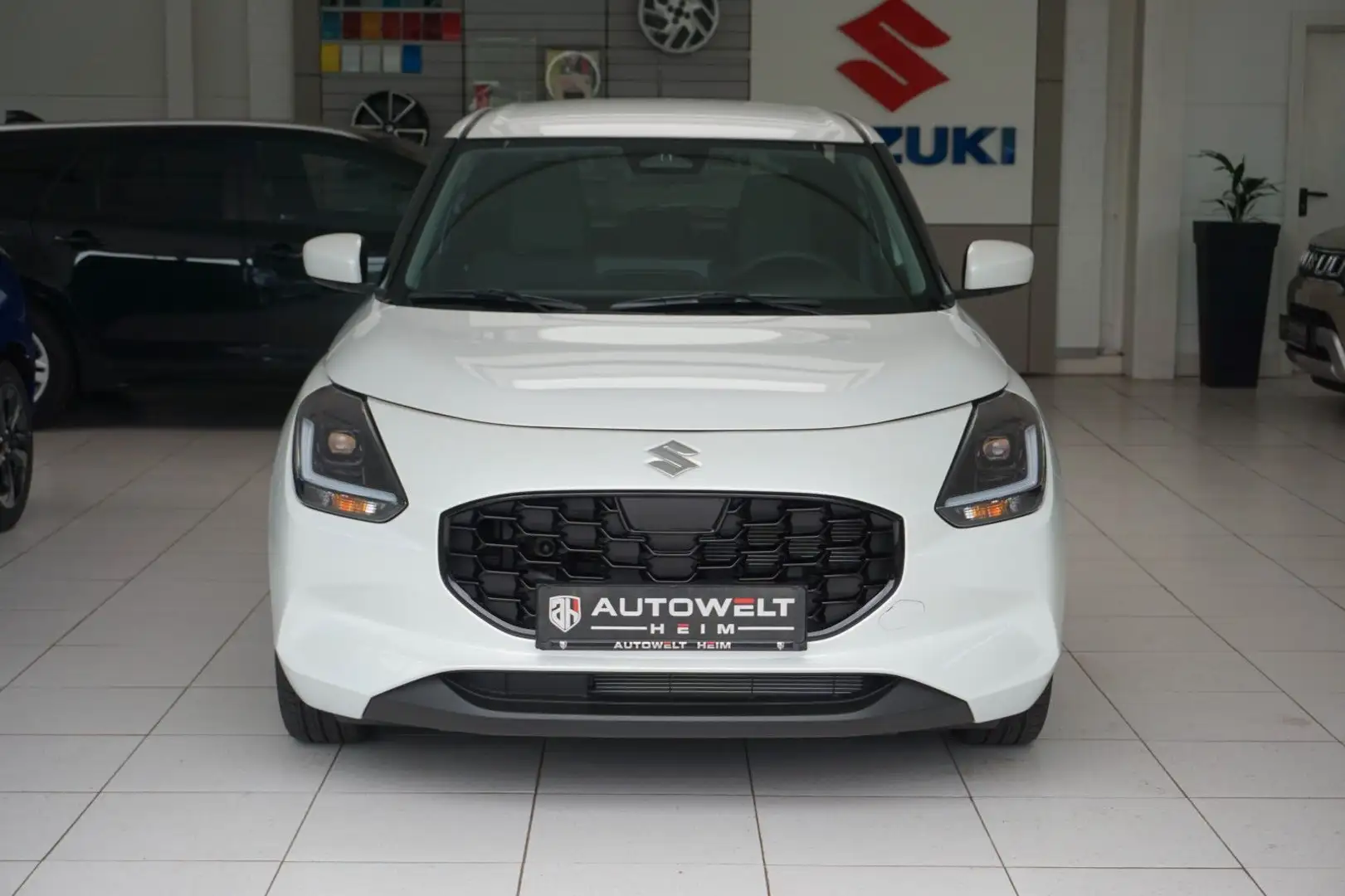 Suzuki Swift *Automatik*Navi*Tempomat*HYBRID* Weiß - 2