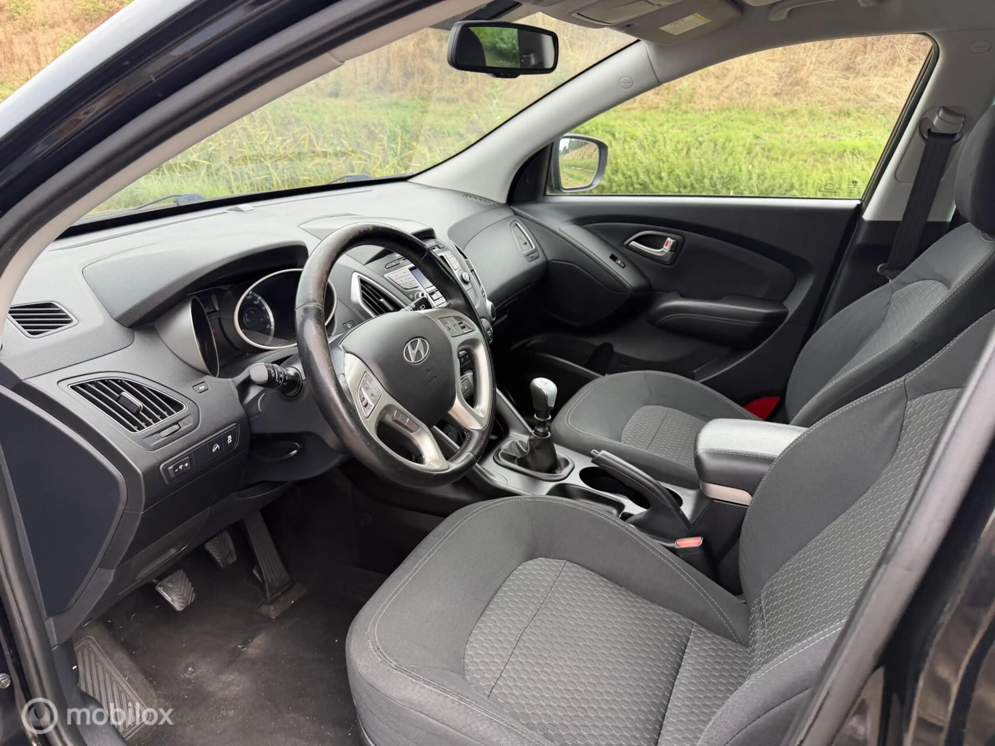 Hyundai iX35 1.6i GDI i-Drive — photo 8