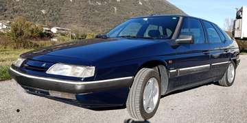 XM 2.0i 4liv. auto cat.