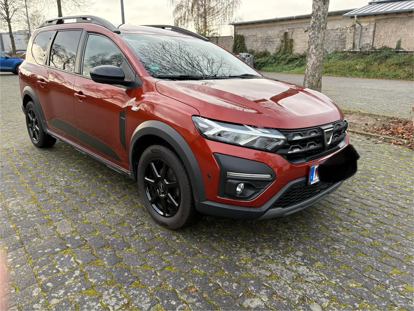 Dacia Jogger Extreme+,7 SITZER;KAMER;LPG;PDC;NAVI;SCHECKHEFT Braun - 1