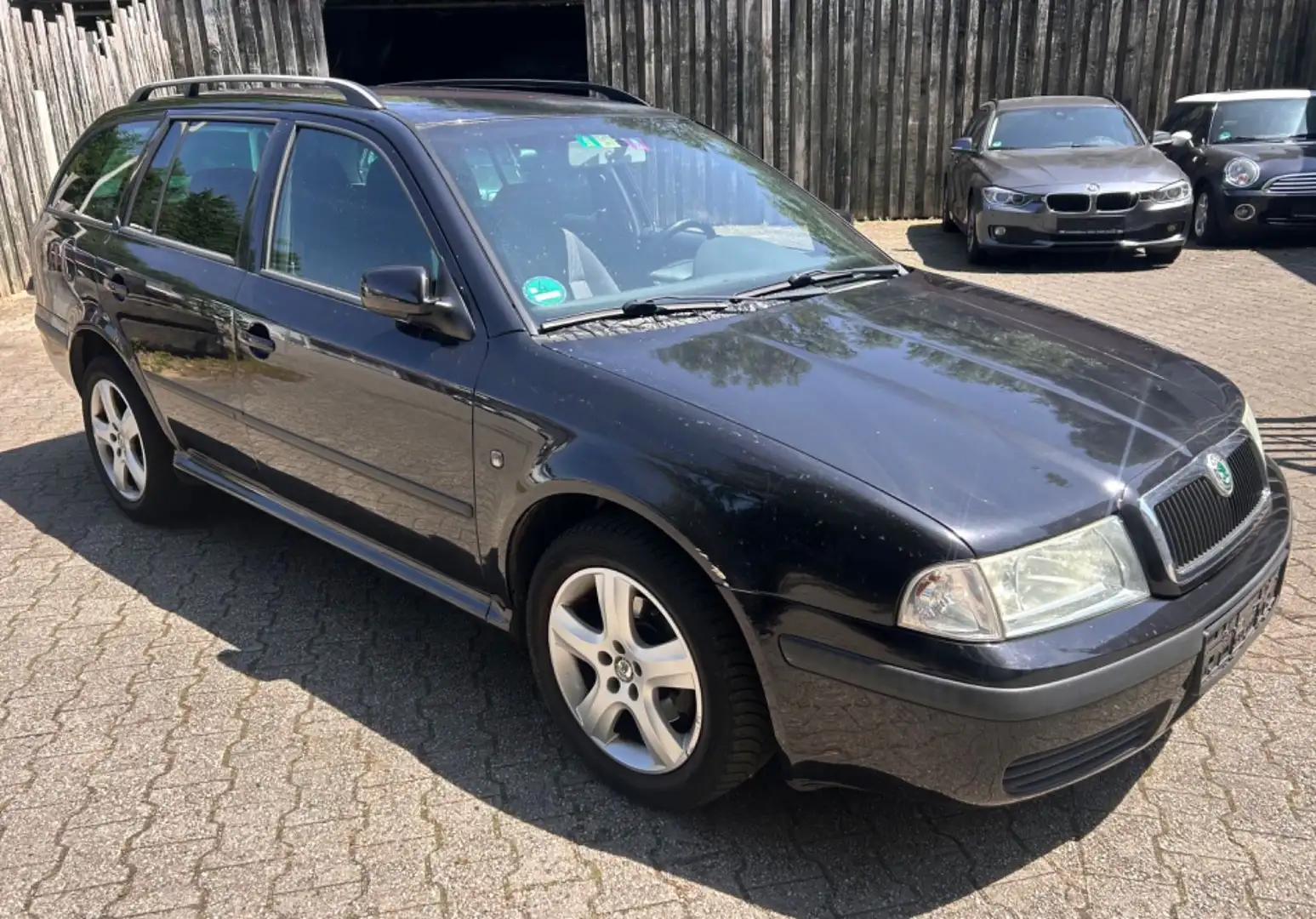 Skoda Octavia Combi Ambiente-Klima-AHK 1.6 Benzin Nero - 1