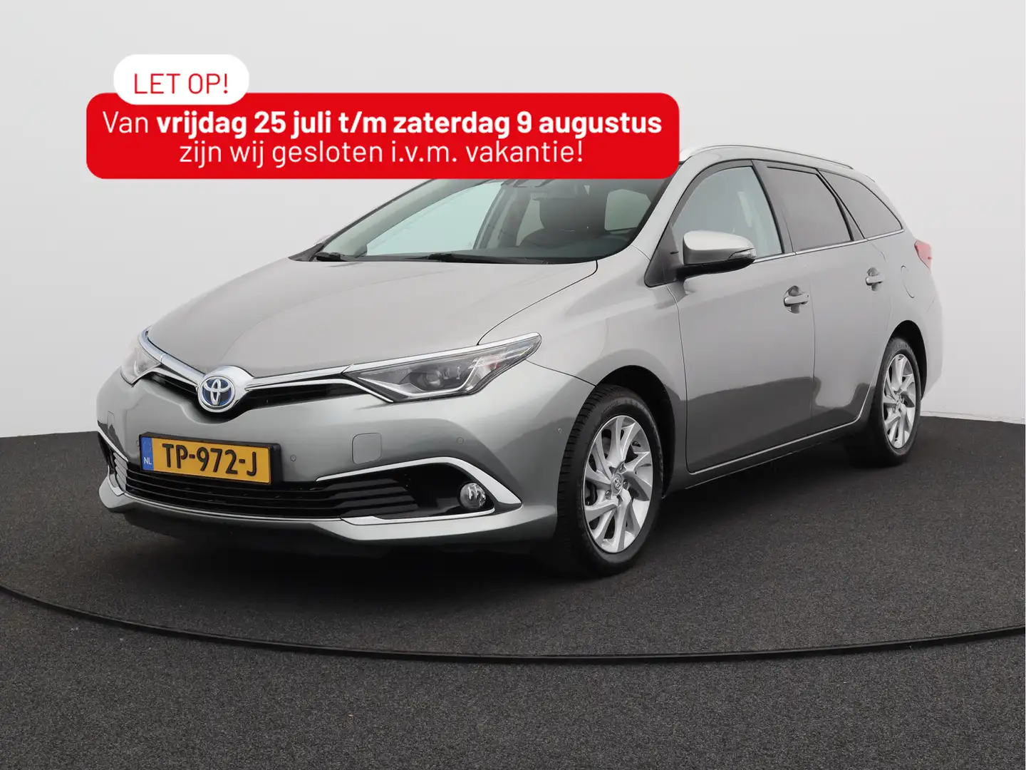 Toyota Auris Touring Sports 1.8 Hybrid Executive/ lage km/ zeer Grijs - 1