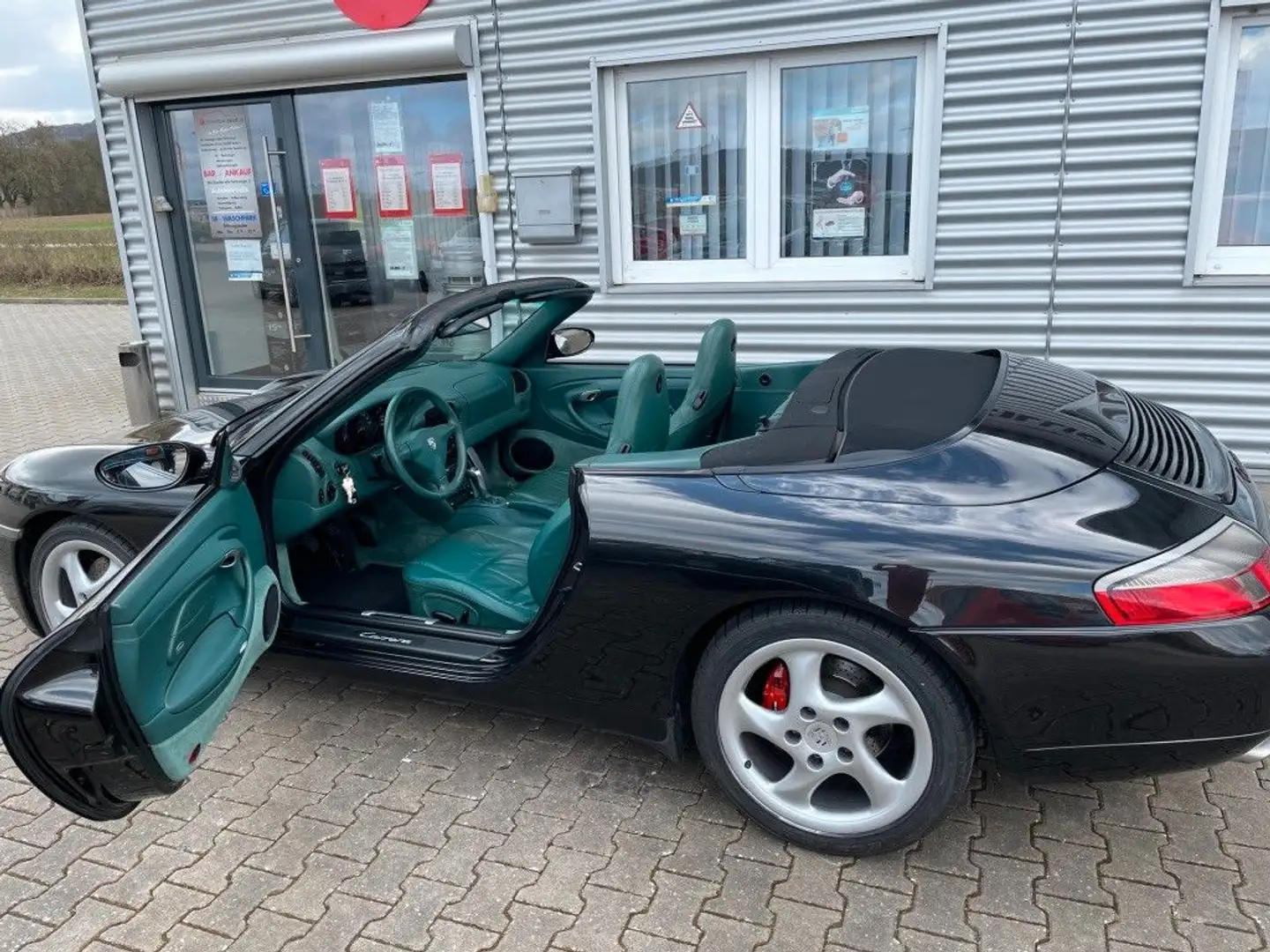 Porsche 911 Carrera Cabrio TURBORAD+NAVI+SHZ+deut. Auto Fekete - 2