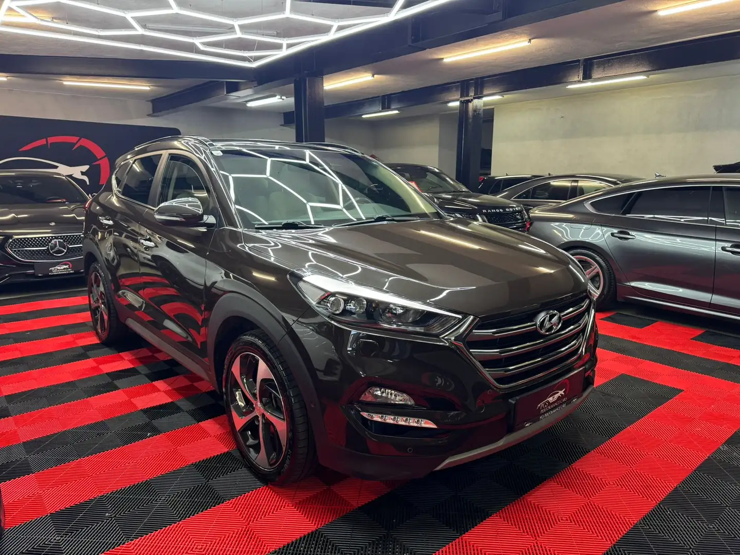 Hyundai TUCSON Platin/4WD/PANO/NAVI Braun - 1