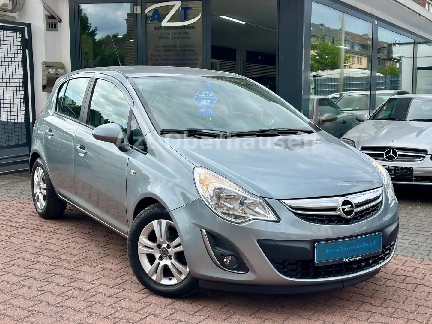 Opel Corsa D 150 Jahre Opel*1.HAND*TÜV NEU*KLIMA*ALU* Silber - 1