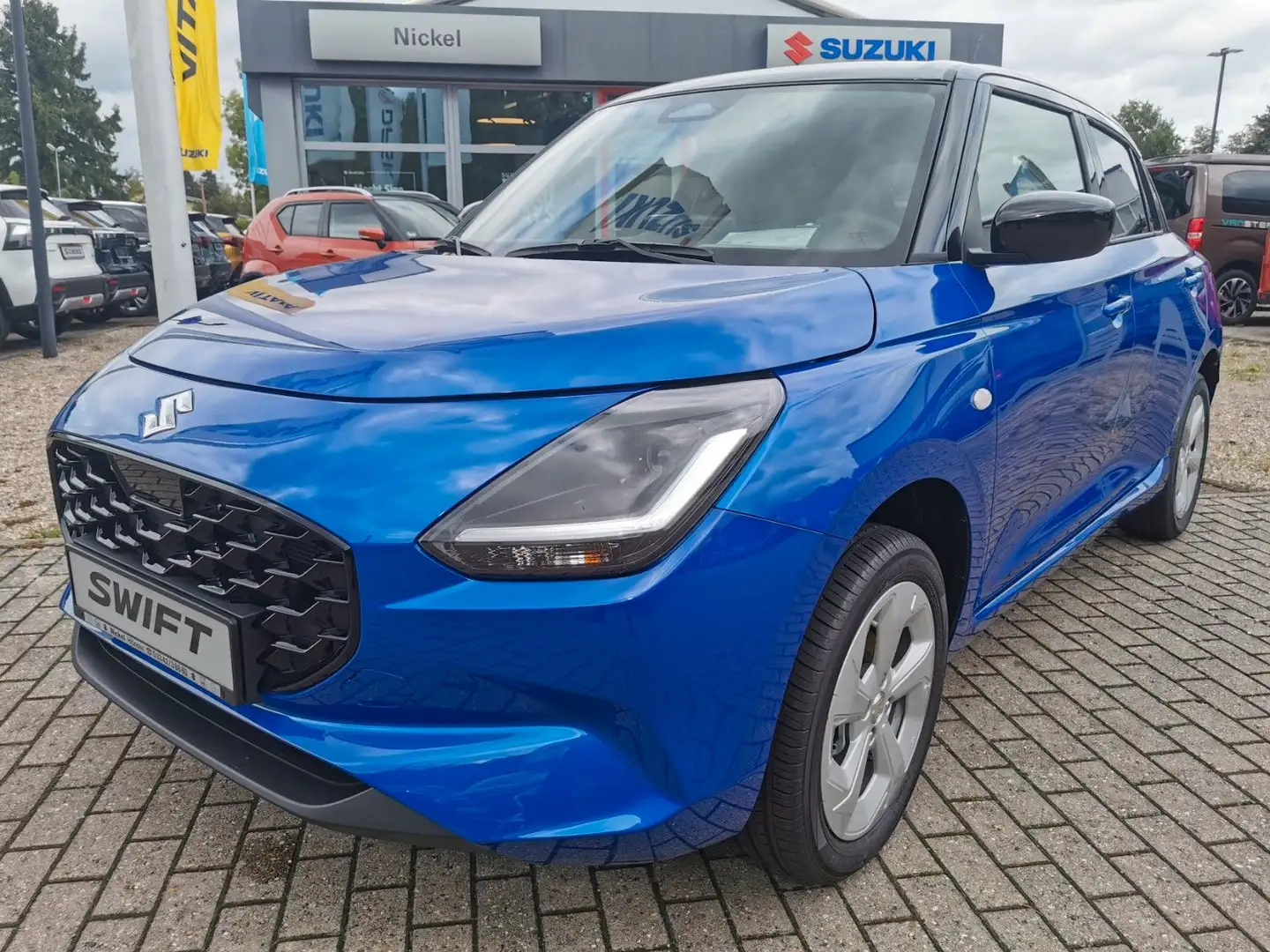 Suzuki Swift 1.2 HYBRID ALLGRIP MT Comfort Blau - 1