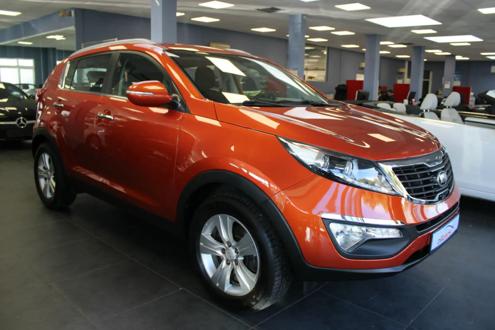 Kia Sportage 1.6 GDI 2WD Attract Orange - 1