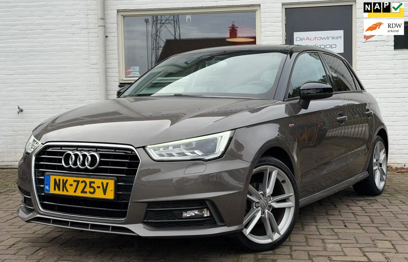 Audi A1 Sportback 1.0 TFSI S-Line Pano PDC Cruise Bruin - 1