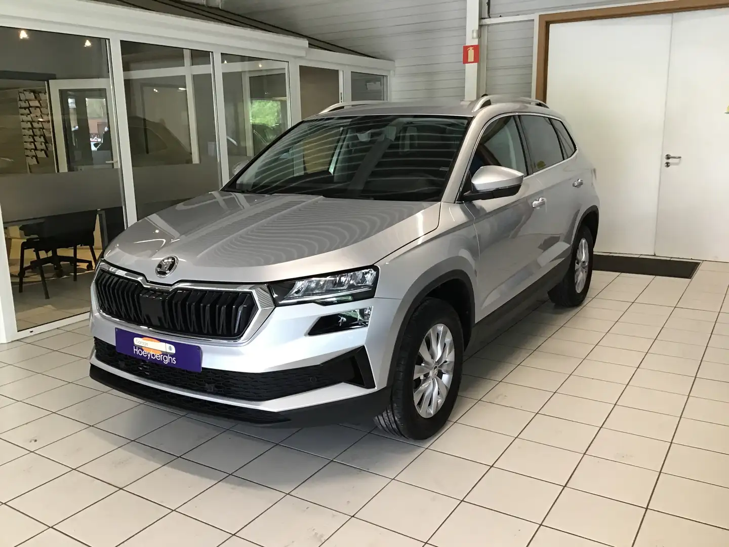 Skoda Karoq 1.5 TSI BJ06/2023 24021KM AIRCO NAVI DABRADIO USB Argento - 1