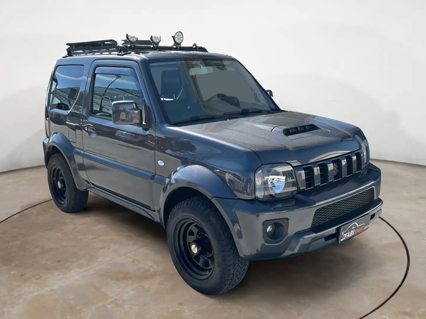 Suzuki Jimny 1.3  Evolution Plus 86 Cv 4WD - Pelle, Fanaliera Gris - 1
